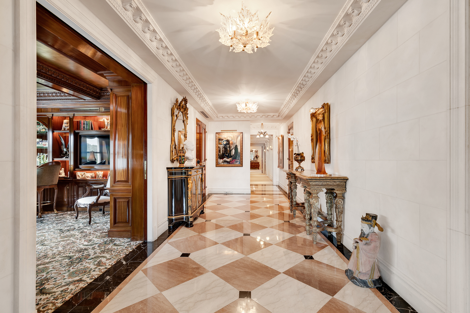 838 5th Avenue, Unit 6 Manhattan, NY 10065 - Photo 11 of 23 a lobby with furniture and a rug