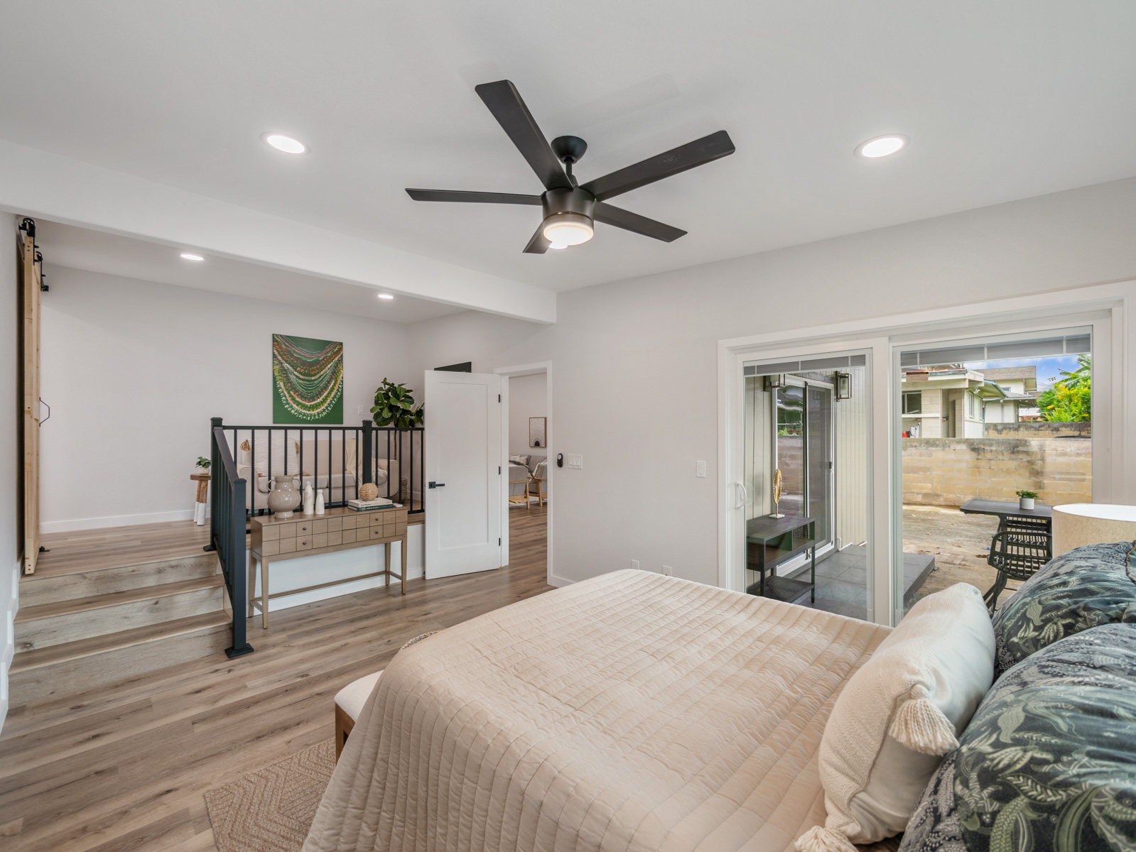 45-561 Paleka Road, Unit C Kaneohe, HI 96744 - Photo 11 of 27 a bedroom with a bed and a large window