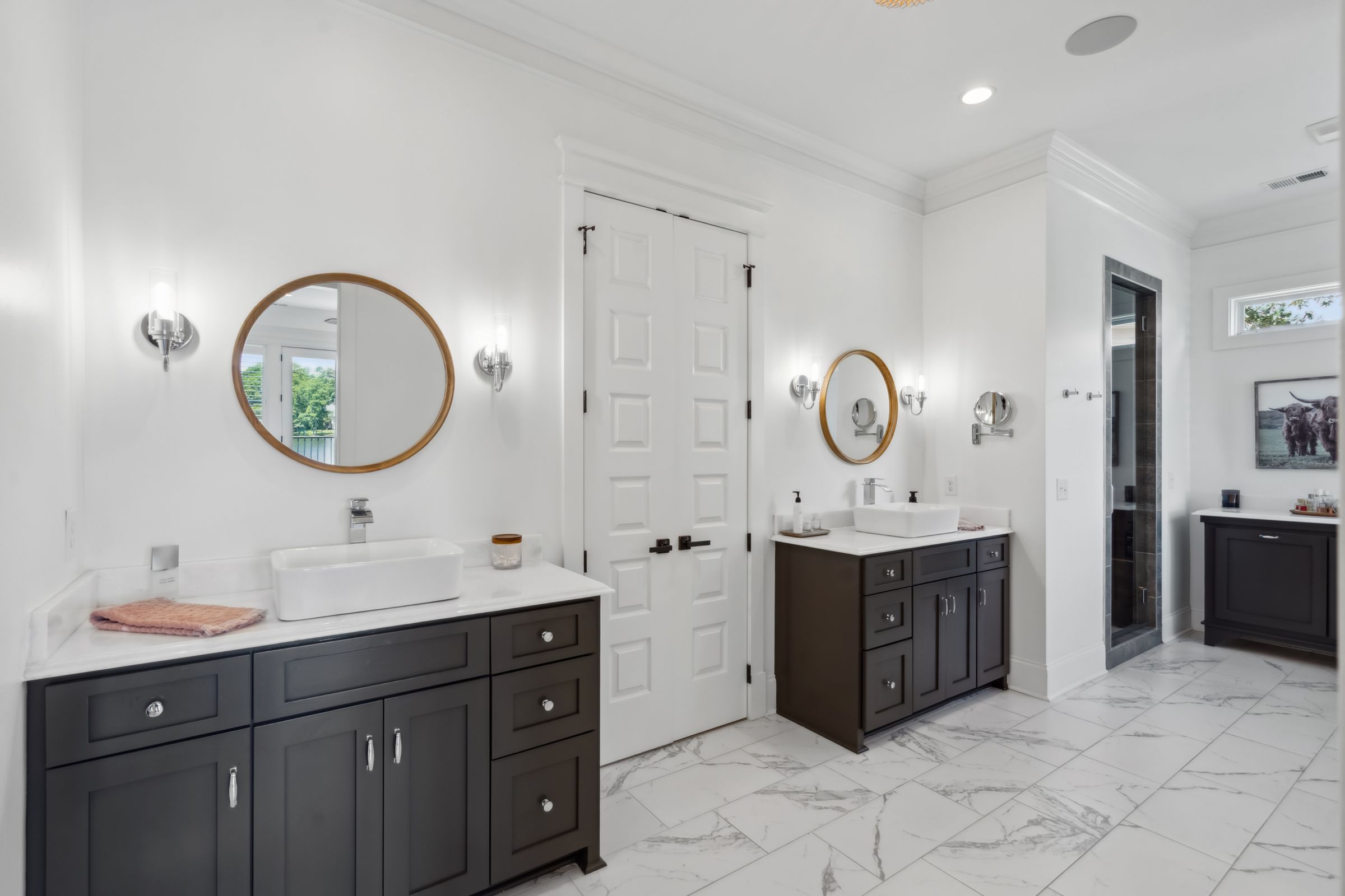 249 Pointe Overlook Drive Chapin, SC 29036 - Photo 23 of 56 a spacious bathroom with a double vanity sink double and a mirror
