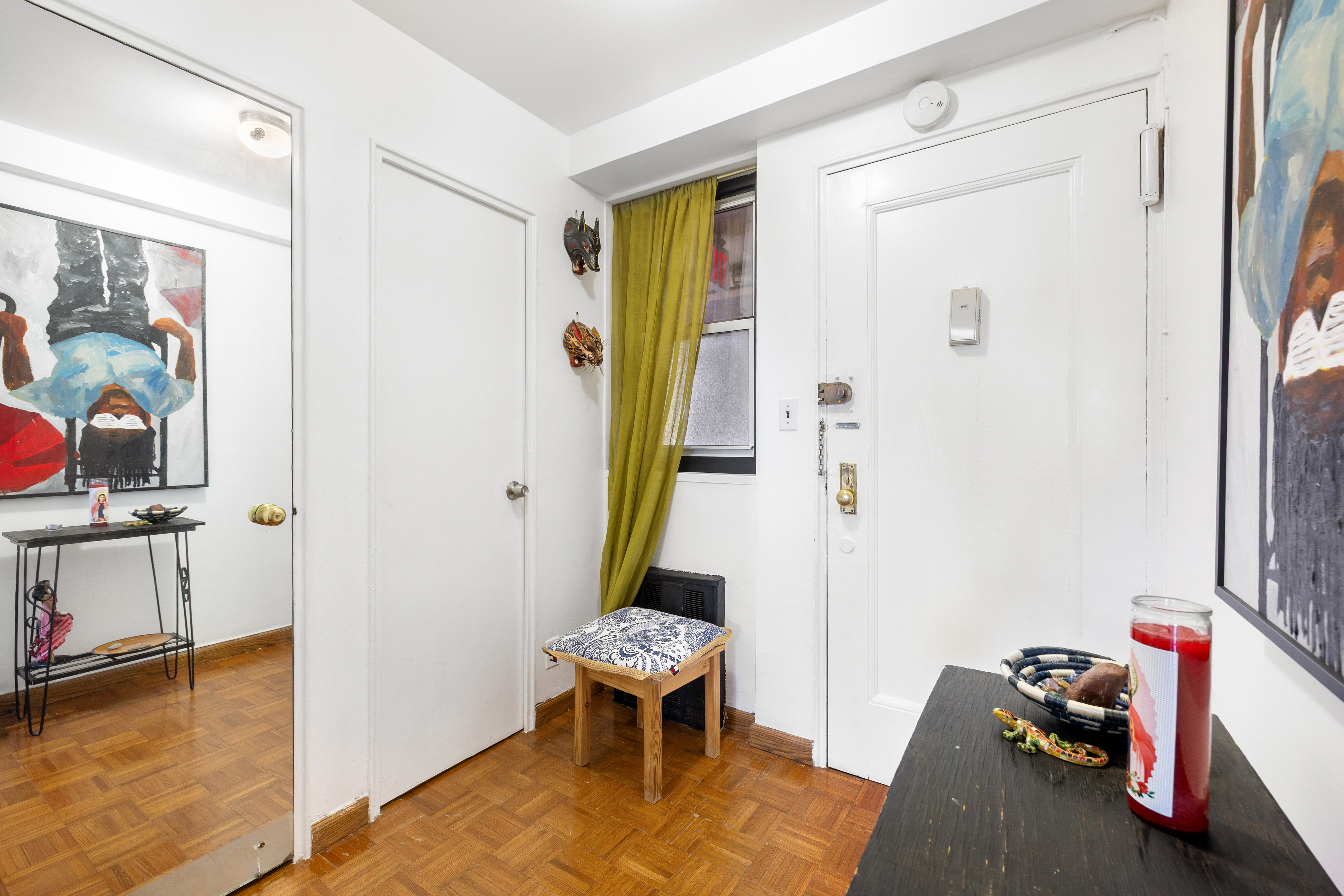 35-11 85th Street, Unit 9A Queens, NY 11372 - Photo 5 of 8 a view of a room with gym equipment
