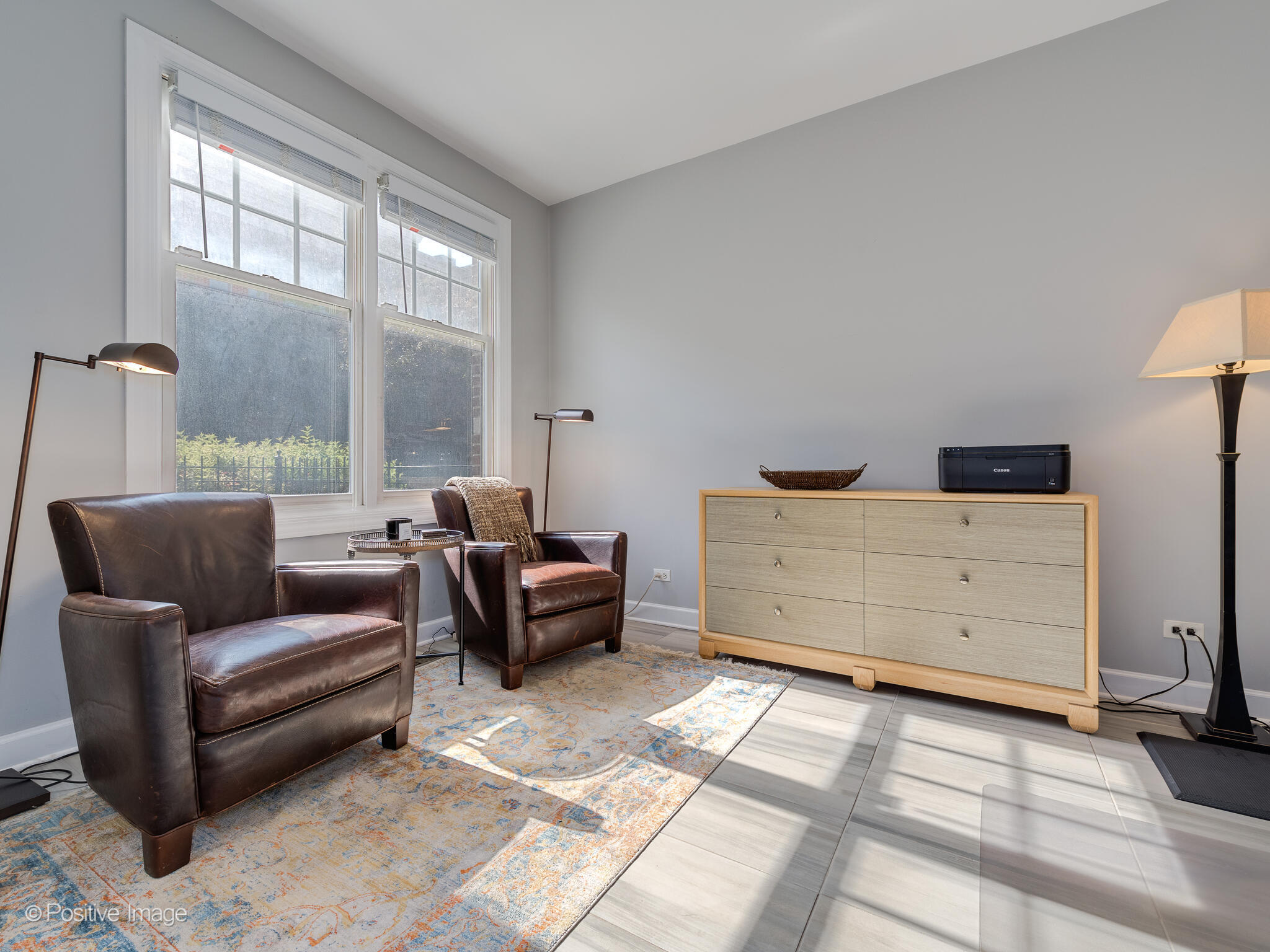 855 North May Street, Unit G Chicago, IL 60642 - Photo 4 of 28 a bedroom with furniture and a window