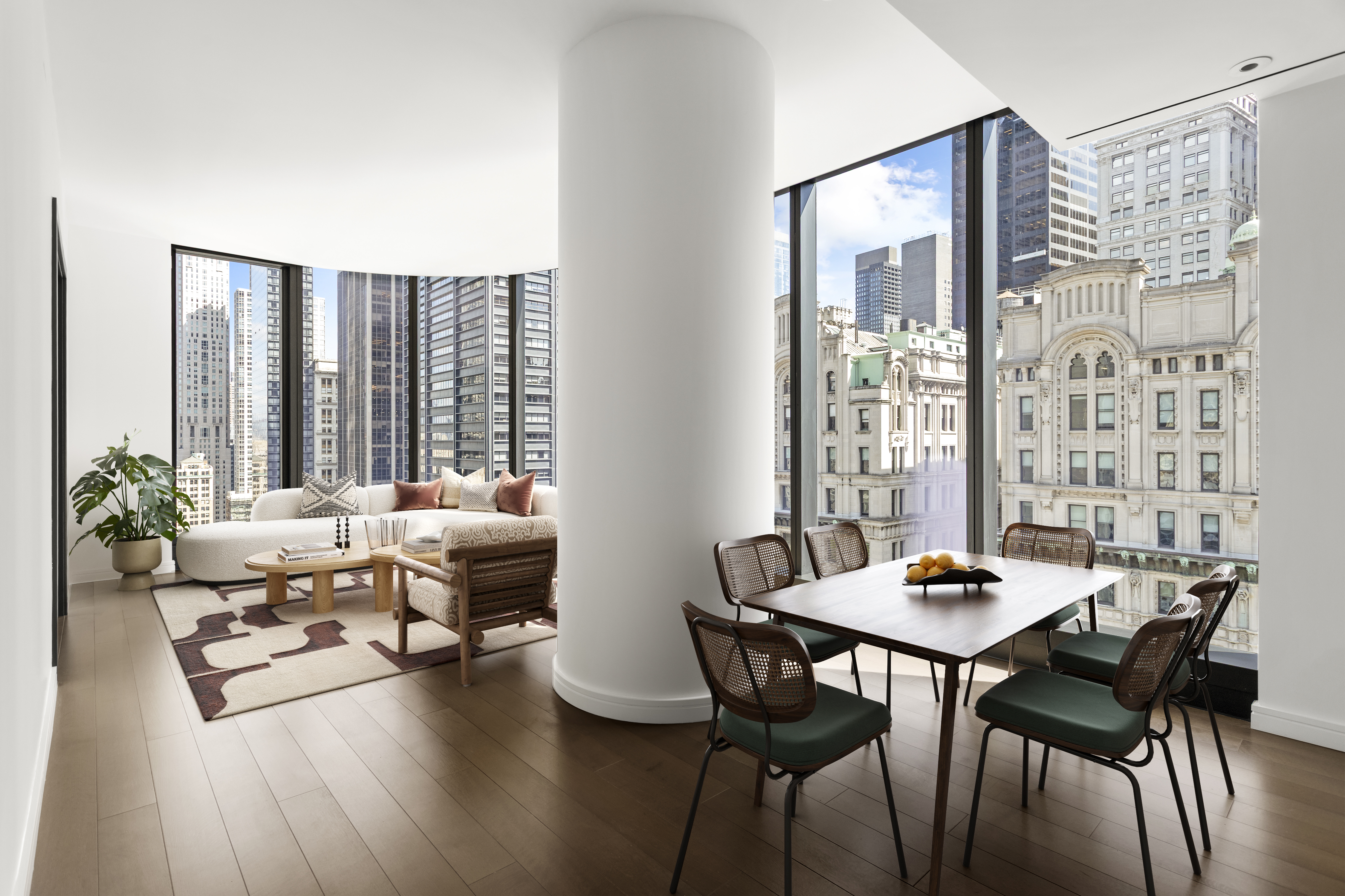 125 Greenwich Street, Unit 31A Manhattan, NY 10006 - Photo 2 of 23 a living room with furniture and wooden floor