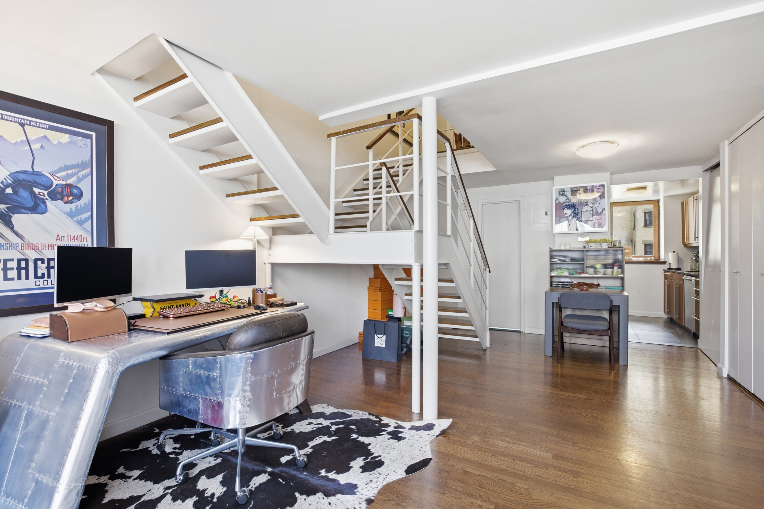305 2nd Avenue, Unit 518 Manhattan, NY 10003 - Photo 5 of 19 a workspace with furniture and wooden floor