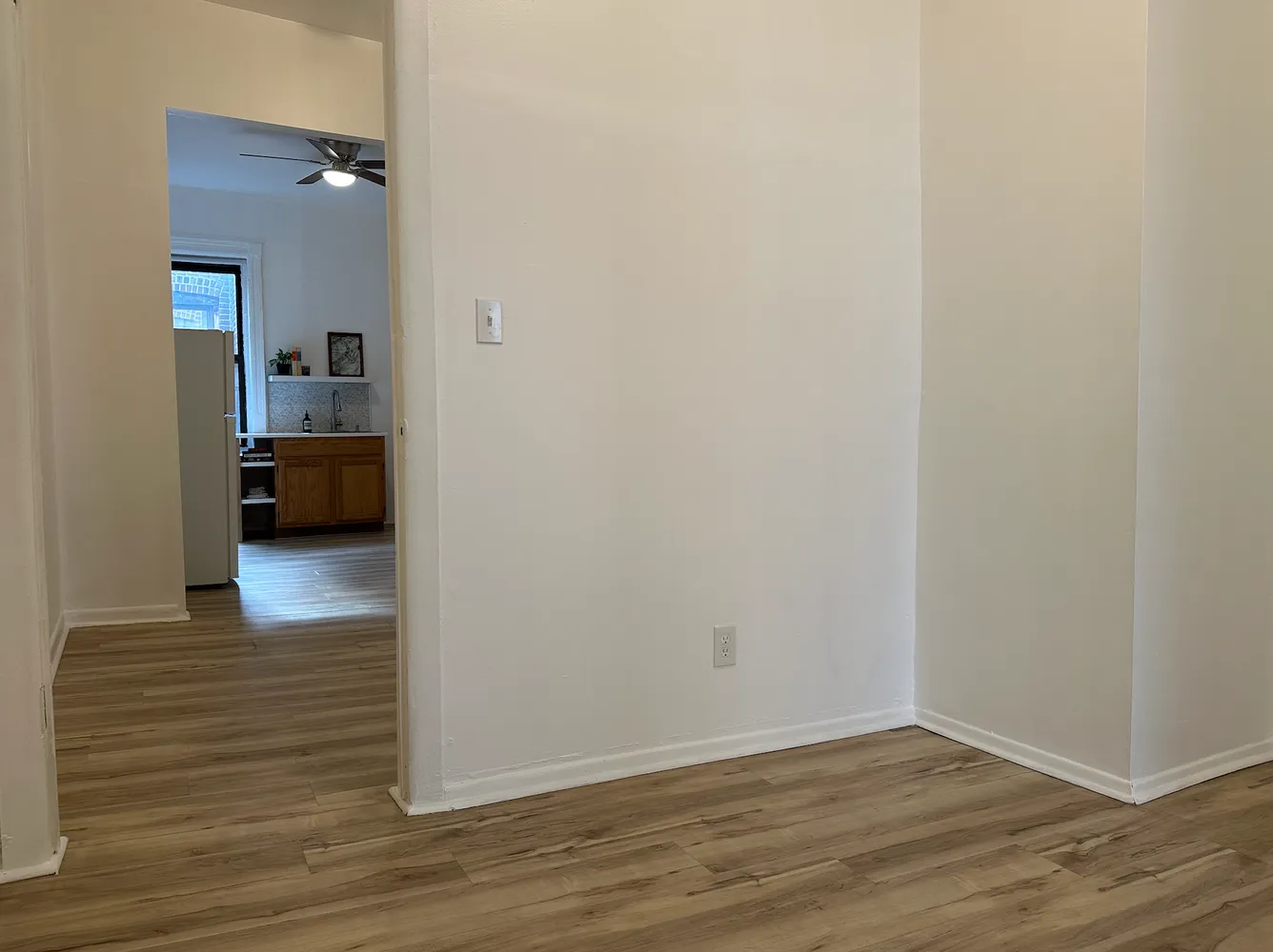 a view of a bedroom from the hallway
