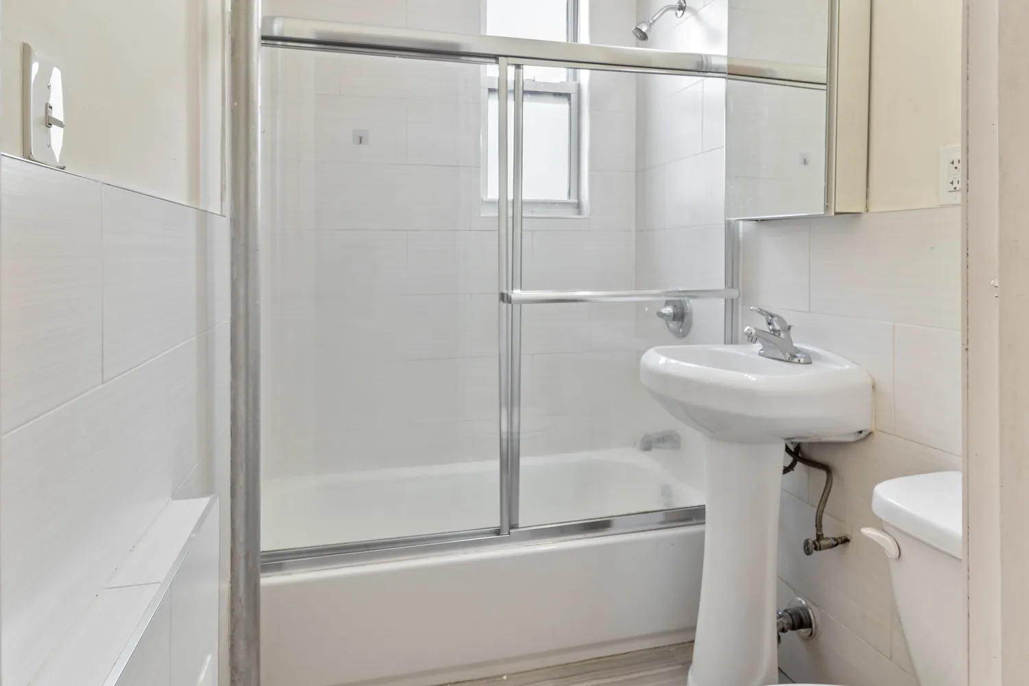 a bathroom with a sink and mirror