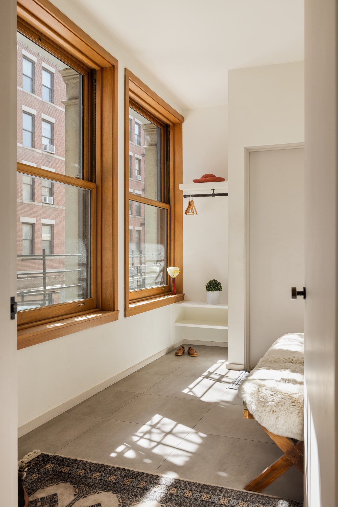 101 Wooster Street, Unit 3F/4F Manhattan, NY 10012 - Photo 20 of 24 a bathroom with a bathtub and a window