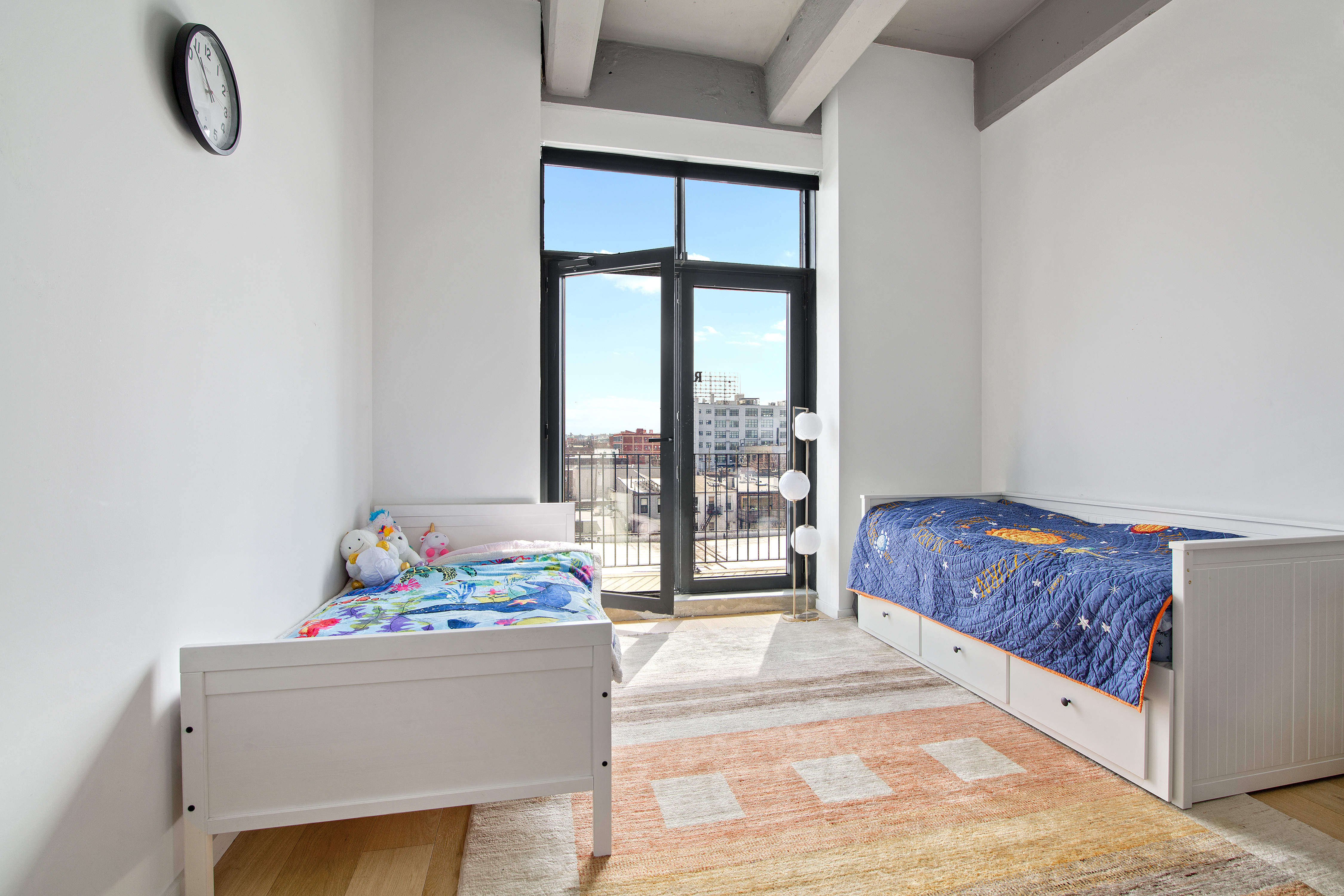 160 Imlay Street, Unit 4E2 Brooklyn, NY 11231 - Photo 5 of 8 a room with a bed and a window