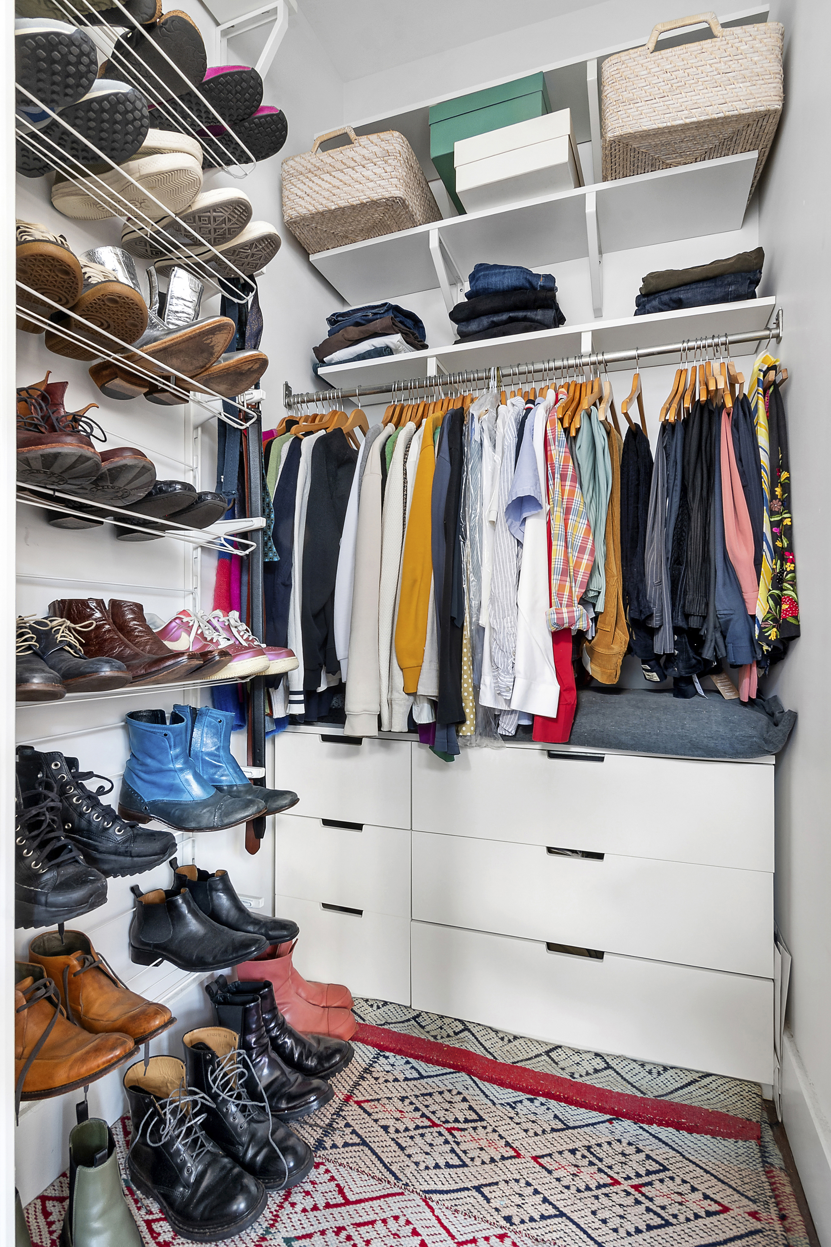 60 Broadway, Unit 2K Brooklyn, NY 11249 - Photo 6 of 7 a view of walk in closet with clothes and shoes