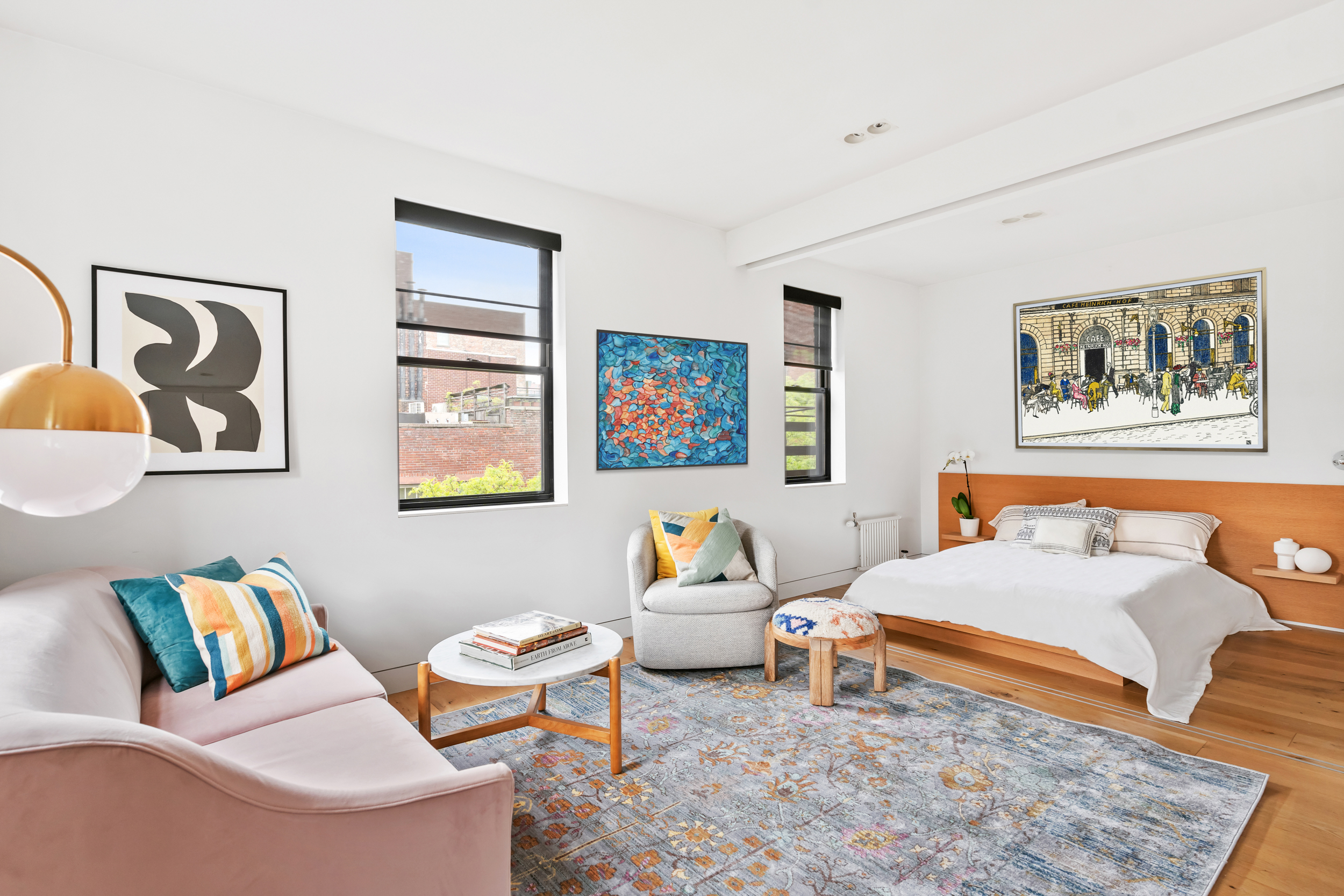 61 Horatio Street, Unit 5F Manhattan, NY 10014 - Photo 6 of 11 a bedroom with a bed and wooden floor