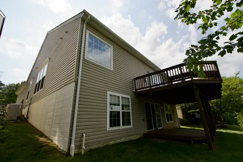 a view of a park with swings and slides