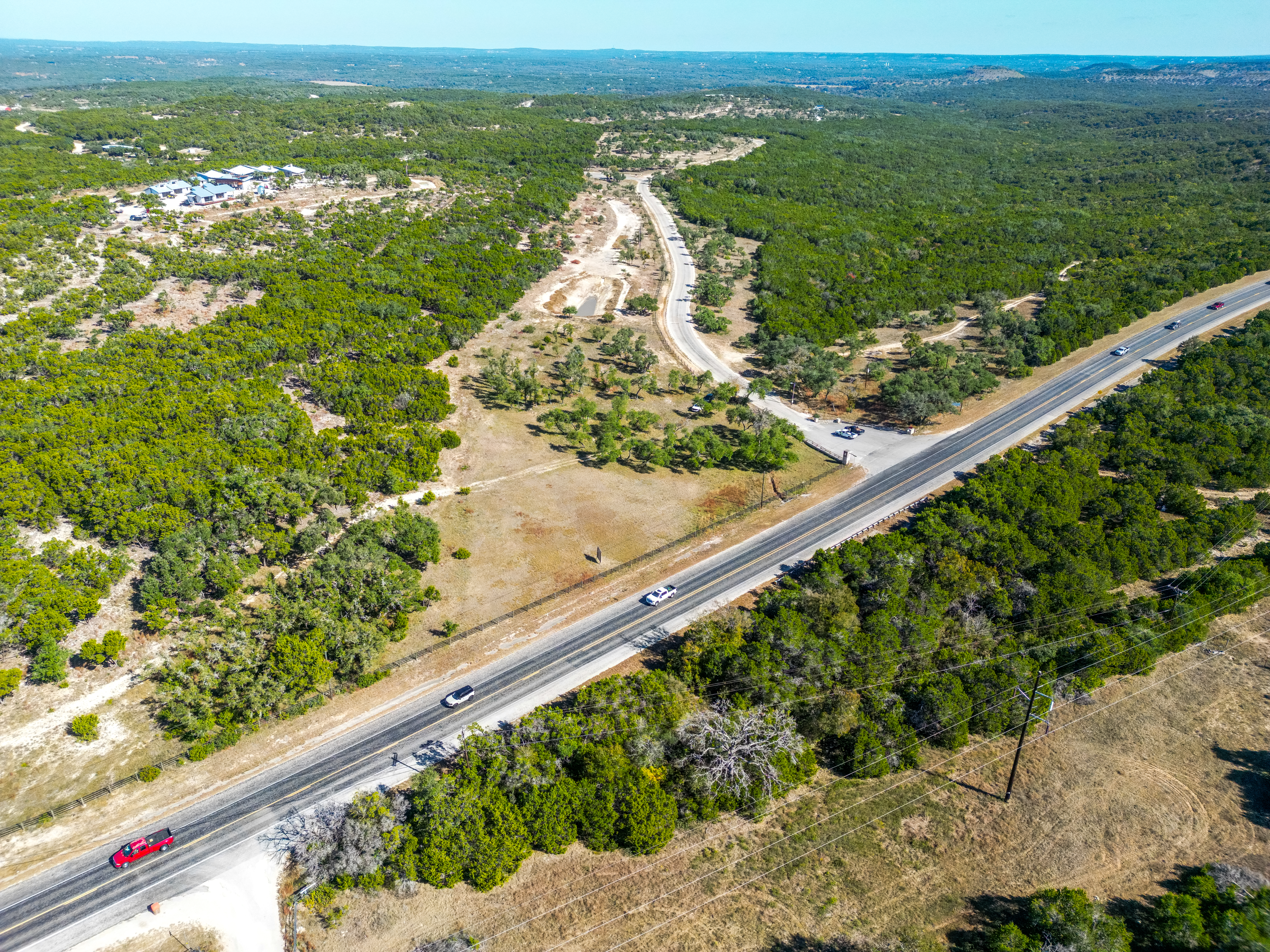 6022 Fm 32 Fischer, TX 78623 - Photo 2 of 15 a view of a city from a balcony