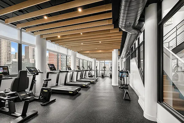 275 West 96th Street, Unit 12B Manhattan, NY 10025 - Photo 21 of 28 a view of a room with gym equipment
