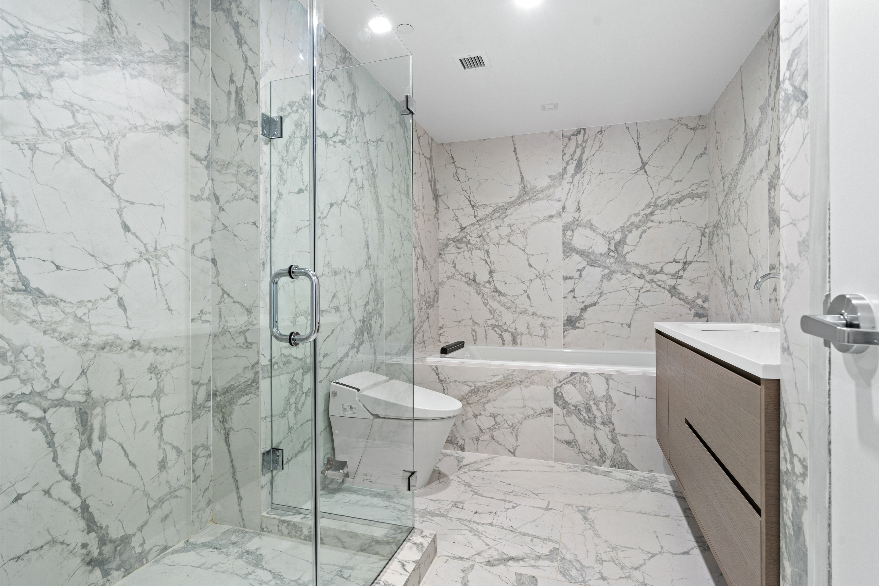 327 East 22nd Street, Unit 3A Manhattan, NY 10010 - Photo 10 of 14 a bathroom with a toilet sink and shower
