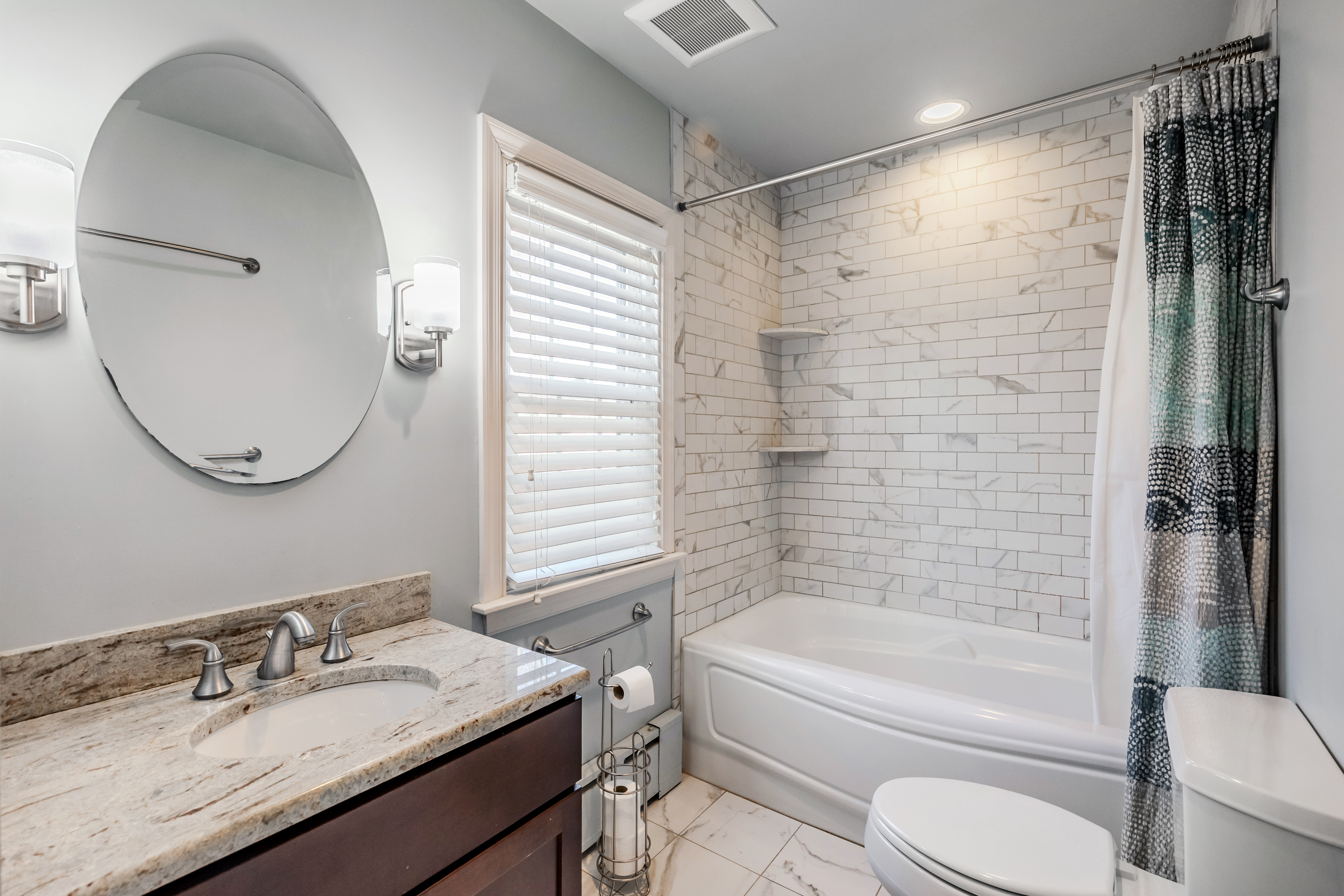 14 Decatur Road Havertown, PA 19083 - Photo 37 of 43 a bathroom with a granite countertop bathtub shower sink vanity mirror and toilet