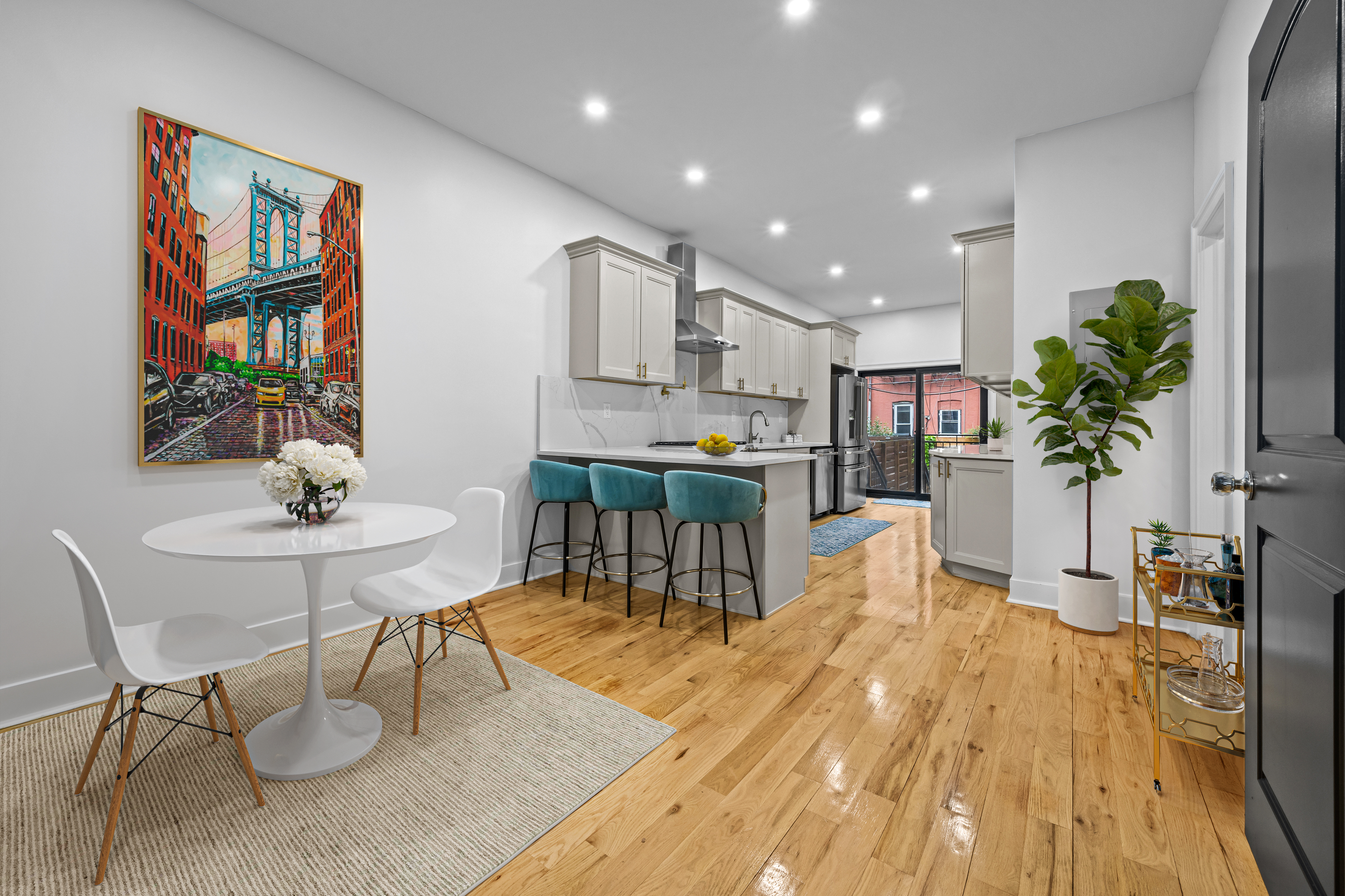 581 Decatur Street Brooklyn, NY 11233 - Photo 10 of 22 a living room with furniture a dining table and kitchen view