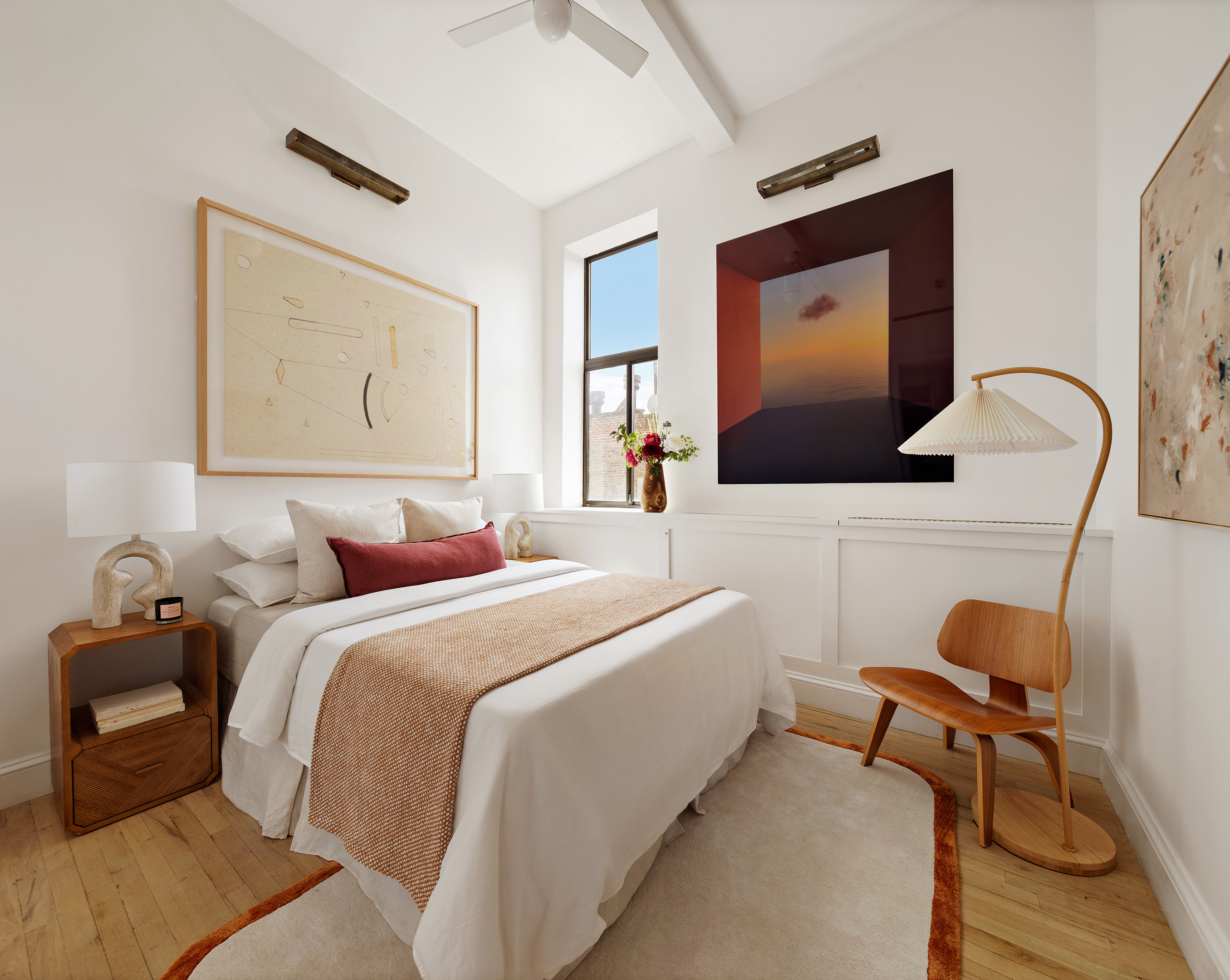 2 Cornelia Street, Unit 506 Manhattan, NY 10014 - Photo 6 of 11 a bedroom with a bed and a flat screen tv