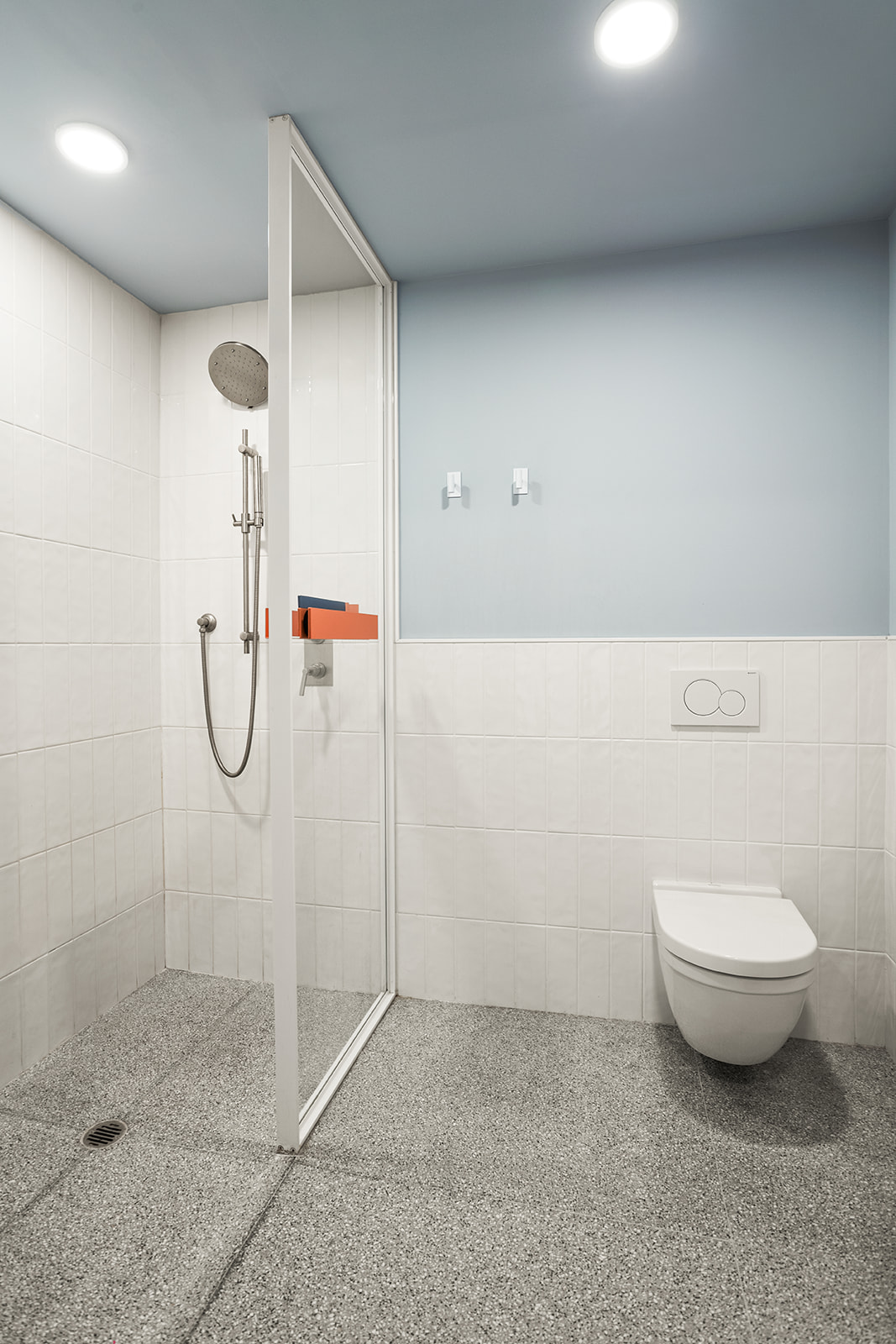 547 West 47th Street, Unit 1102 Manhattan, NY 10036 - Photo 8 of 19 a bathroom with a granite countertop shower and a sink