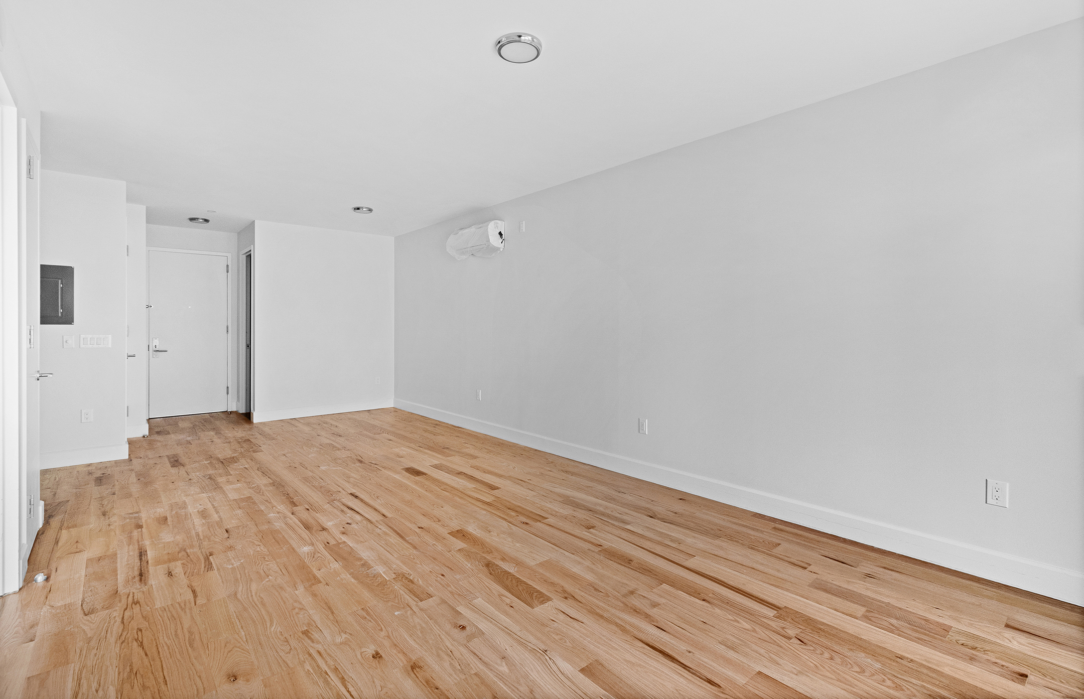 1098 Madison Street, Unit 4B Brooklyn, NY 11221 - Photo 3 of 11 a view of empty room with wooden floor