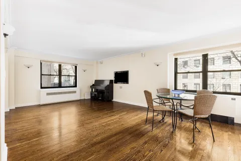 a view of a livingroom with furniture and window
