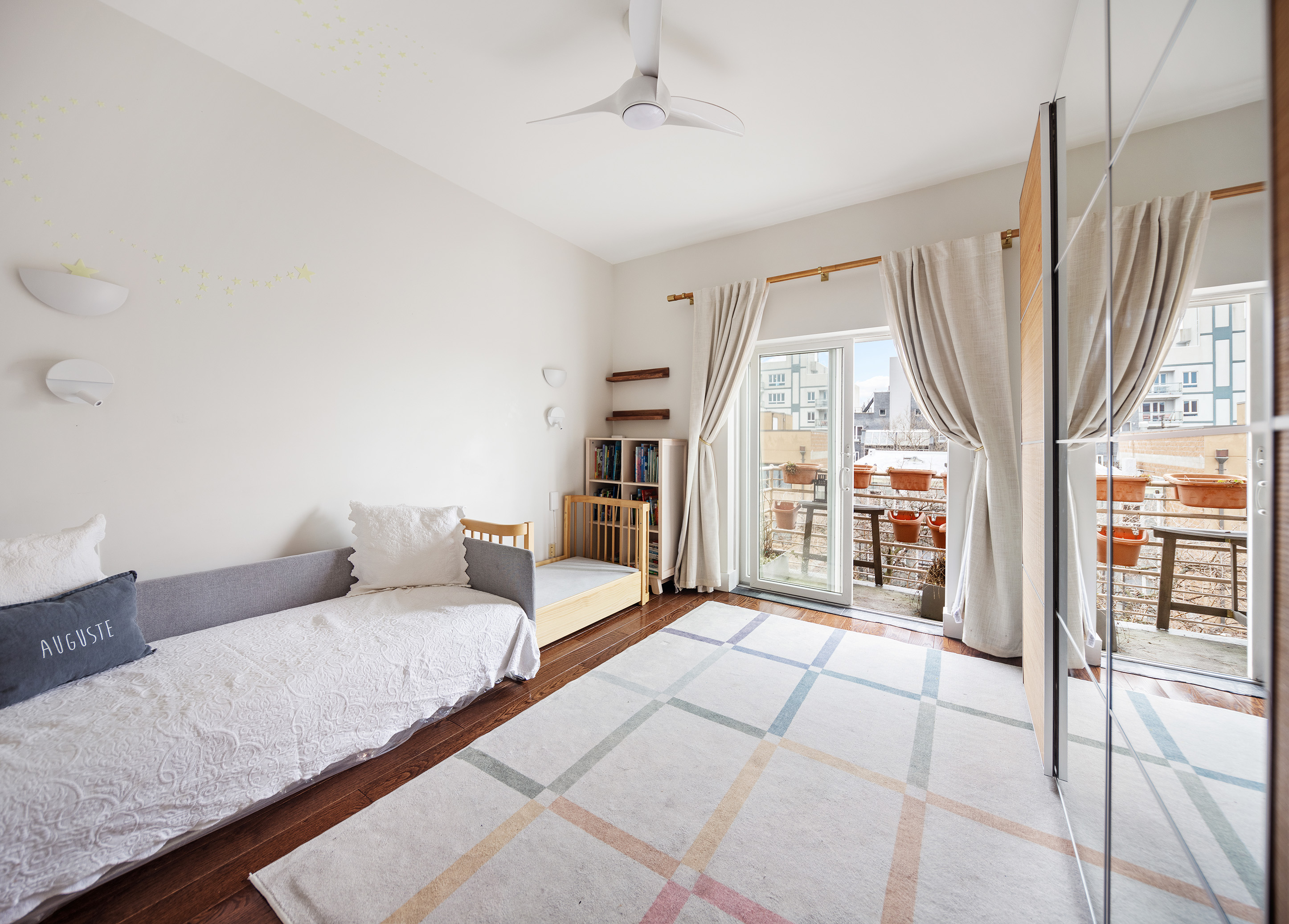 149 Conselyea Street, Unit 4B Brooklyn, NY 11211 - Photo 6 of 10 a living room with furniture and a large window