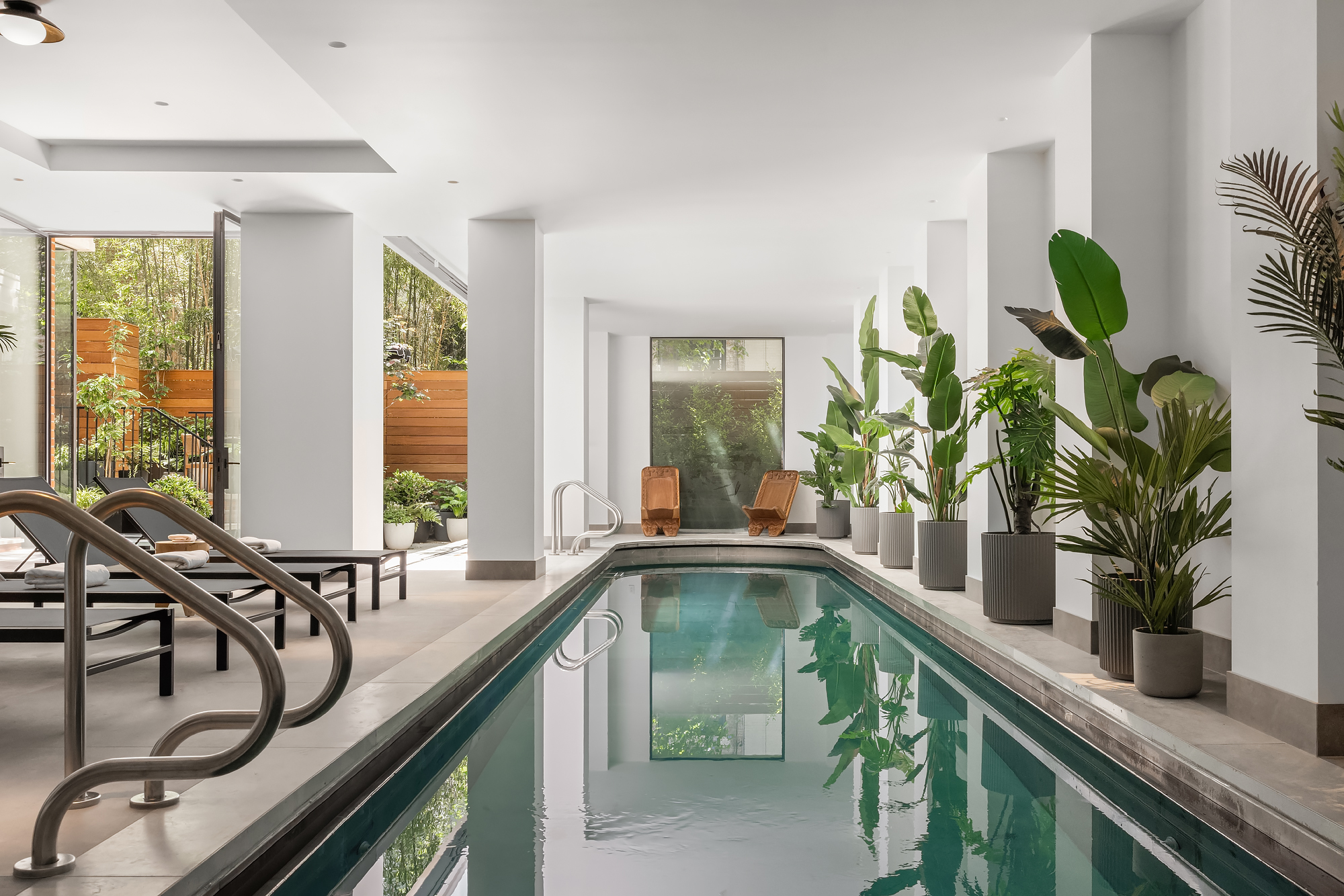 48-50 West 69th Street Manhattan, NY 10023 - Photo 24 of 33 a kitchen with a counter top a sink and a window