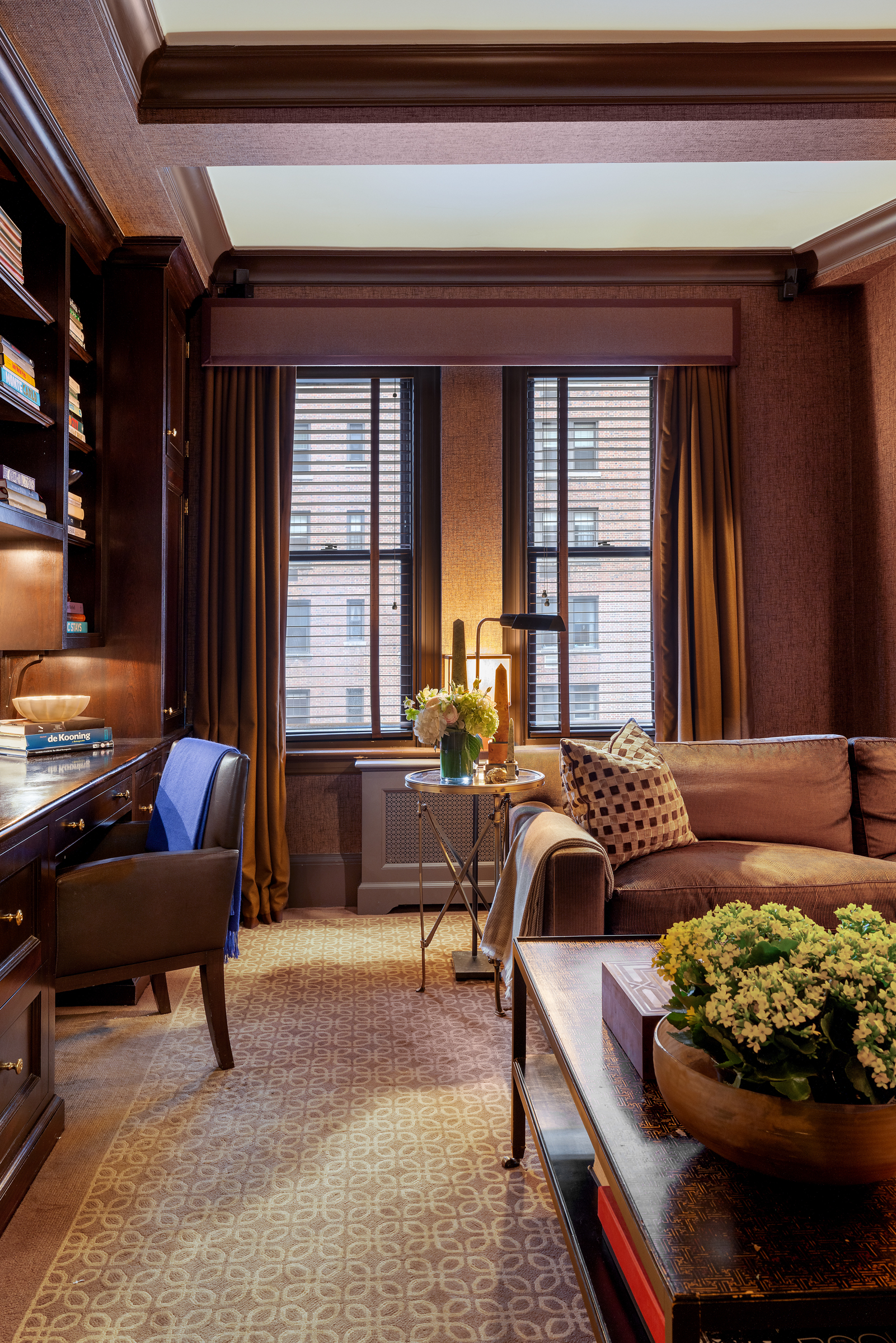 419 East 57th Street, Unit 6A Manhattan, NY 10022 - Photo 6 of 13 a living room with furniture and a large window