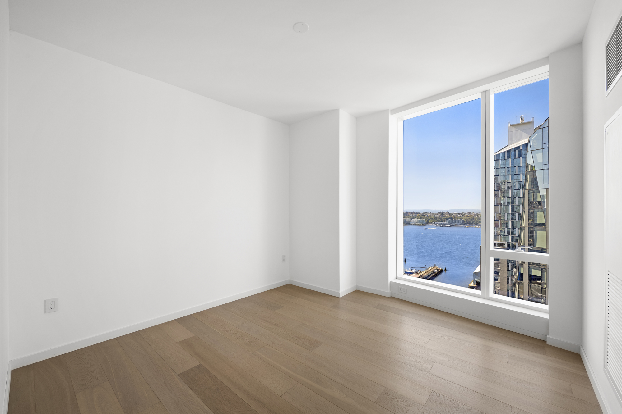 1 West End Avenue, Unit 26G Manhattan, NY 10023 - Photo 13 of 33 a view of an empty room with a window