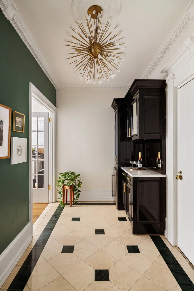 a view of kitchen with cabinets and outdoor space