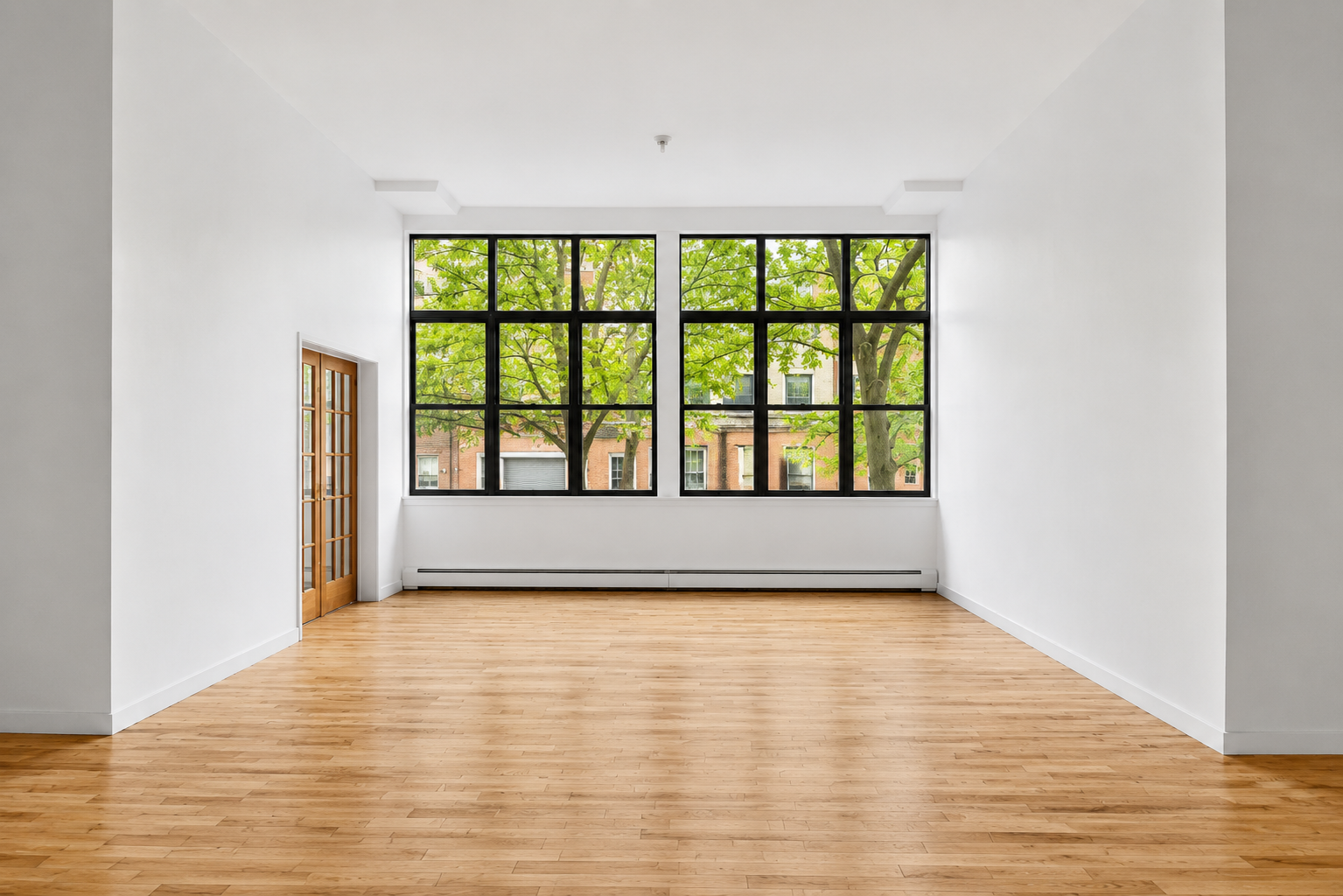 110 Clifton Place, Unit 2B Brooklyn, NY 11238 - Photo 2 of 7 a view of an empty room with wooden floor and a window