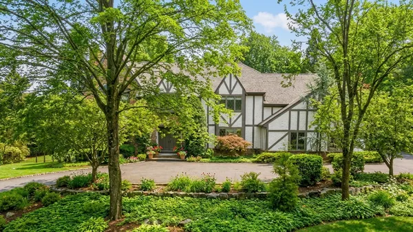 a view of a patio with couches and a fire pit