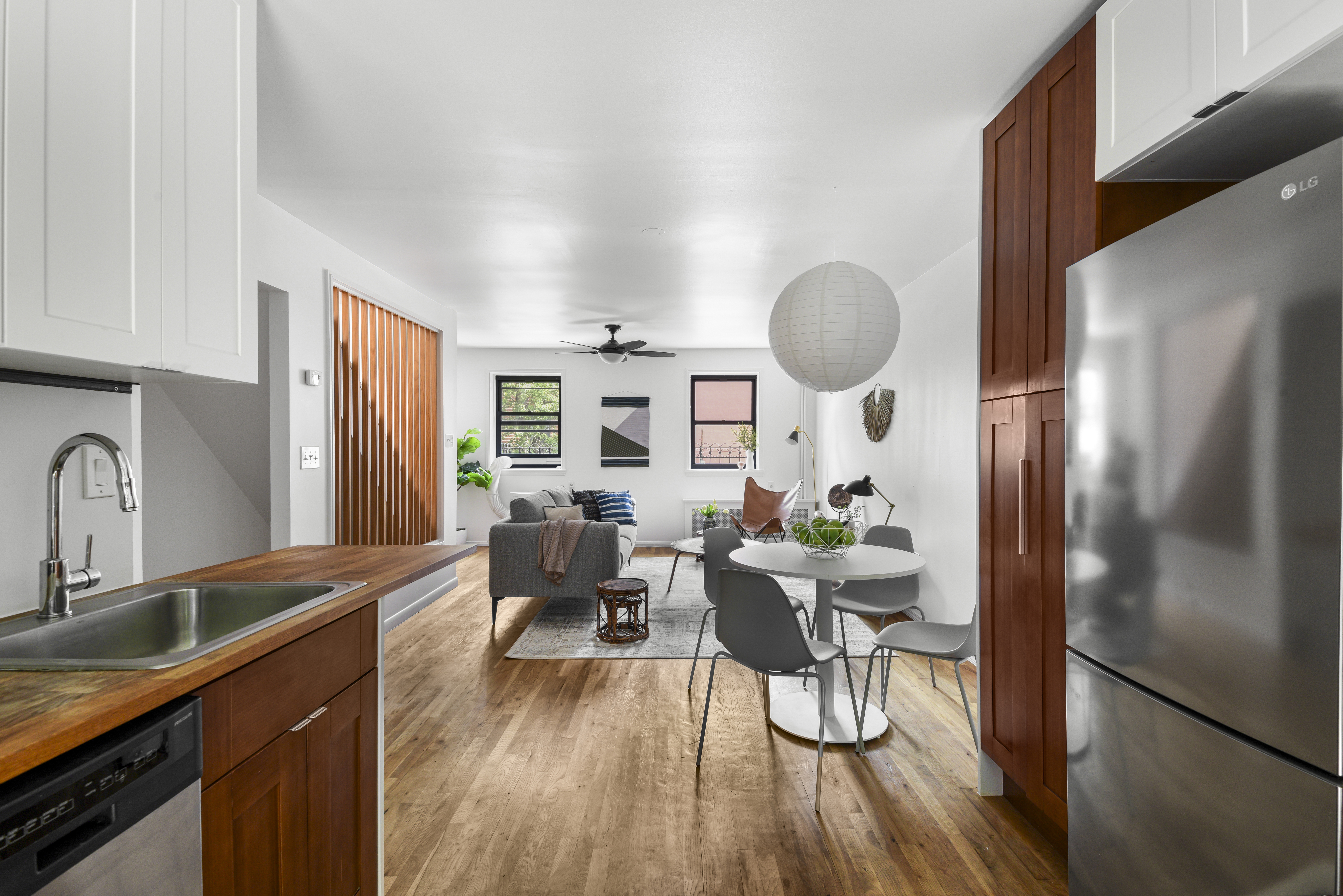 444 Union Street Brooklyn, NY 11231 - Photo 5 of 13 a living room with furniture a dining table and wooden floor