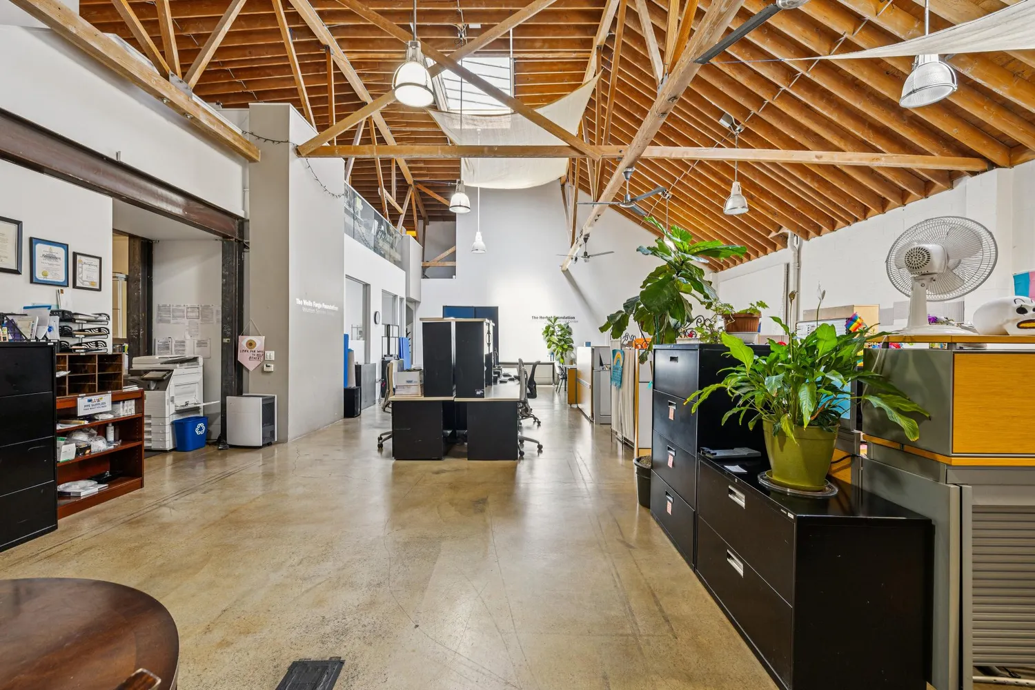 a kitchen with stainless steel appliances a refrigerator a stove a microwave and cabinets