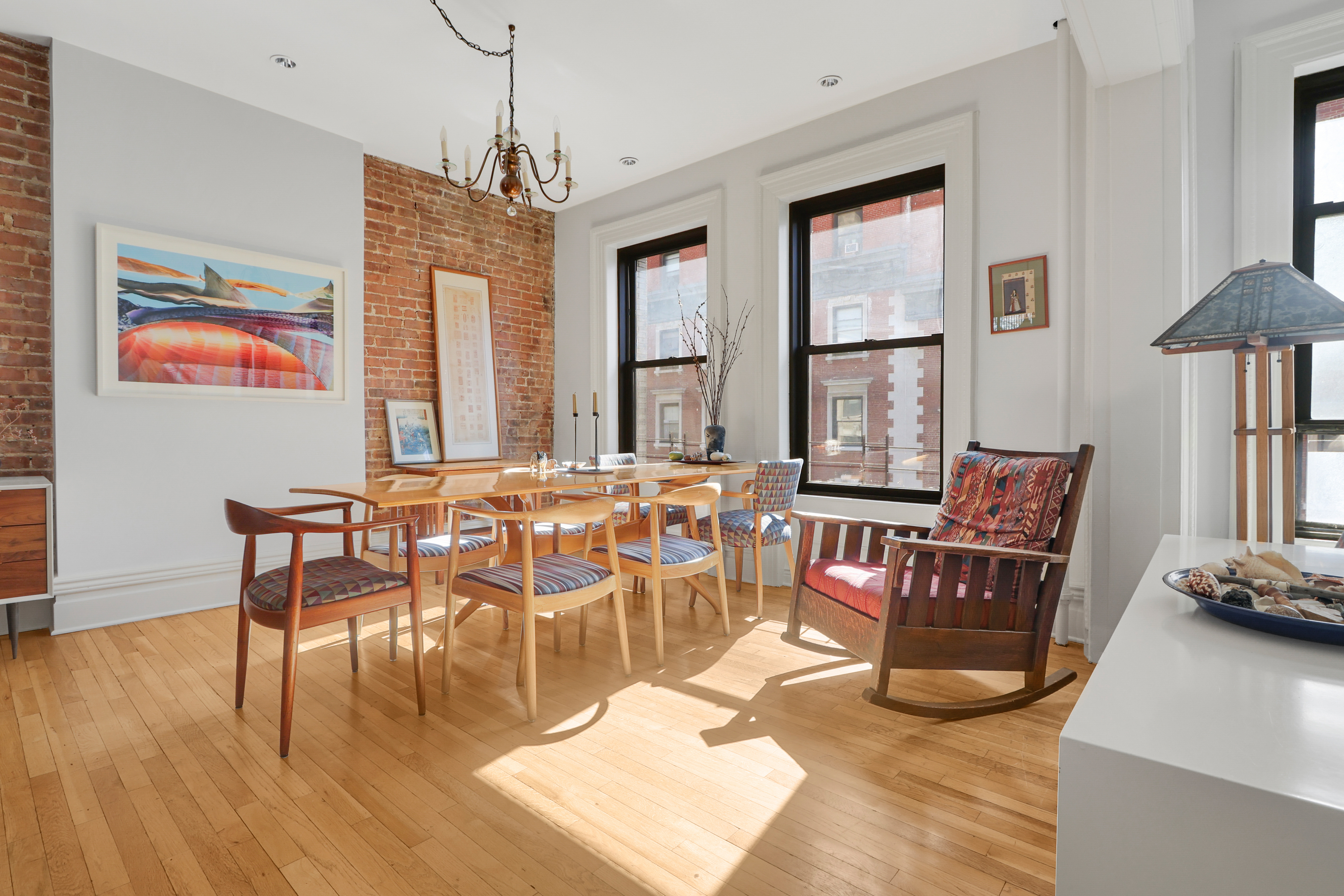 311 West 97th Street, Unit 6E Manhattan, NY 10025 - Photo 7 of 18 a view of a dining room with furniture window and wooden floor