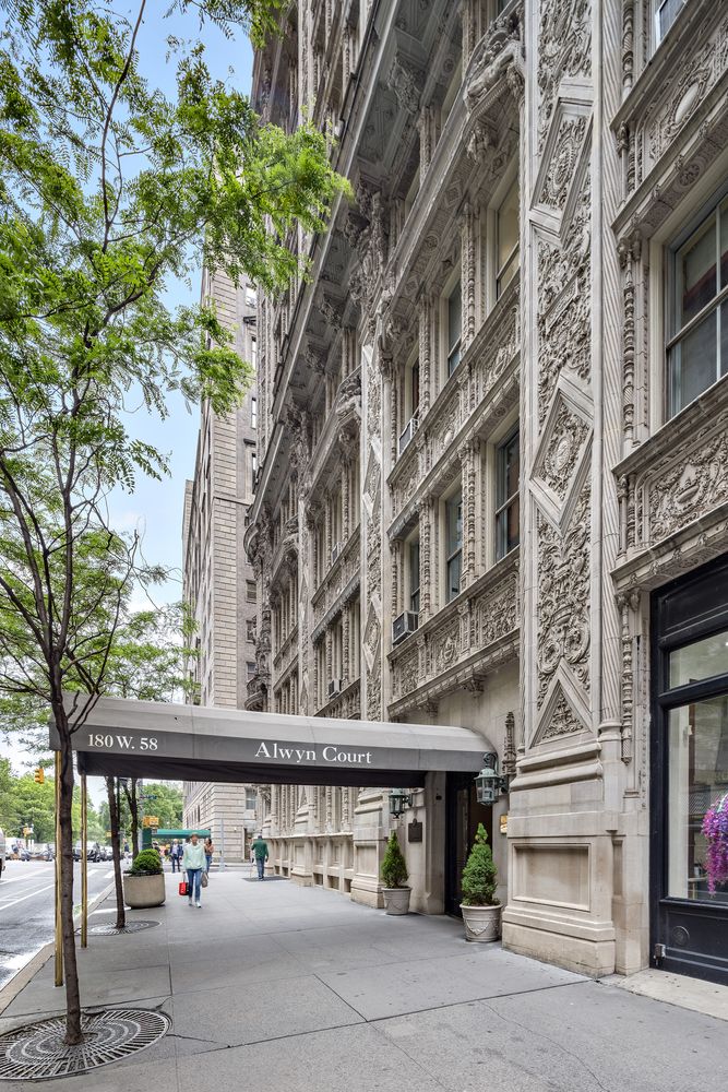 180 West 58th Street, Unit 5A Manhattan, NY 10019 - Photo 14 of 17 a view of building with a street