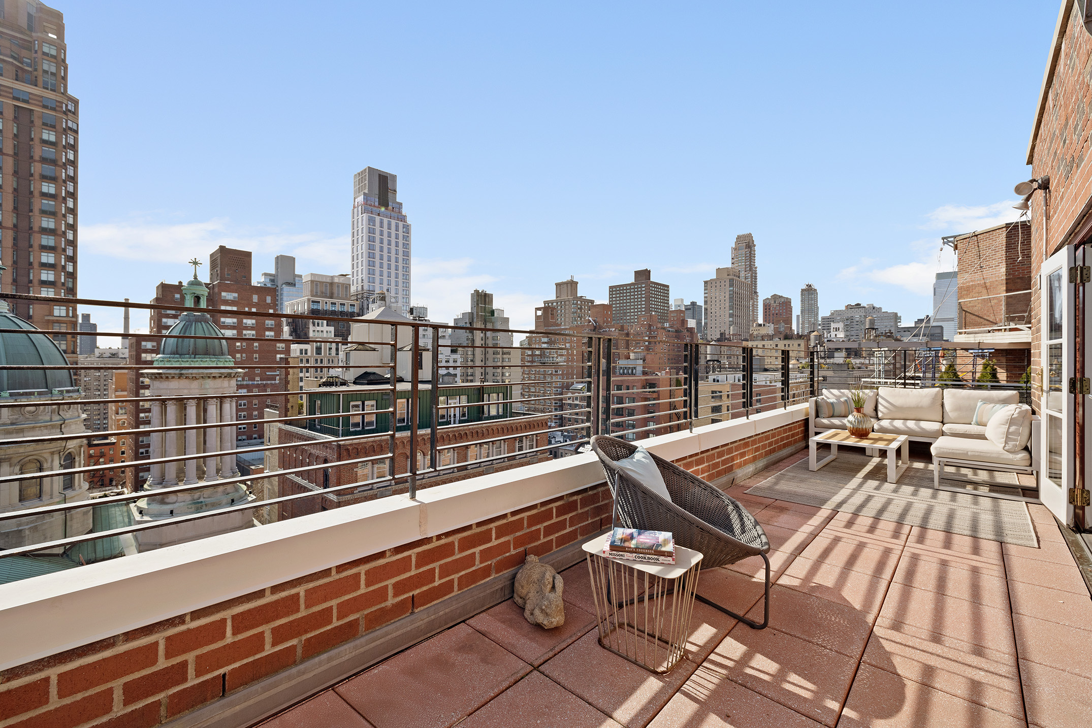 a view of a balcony with city view