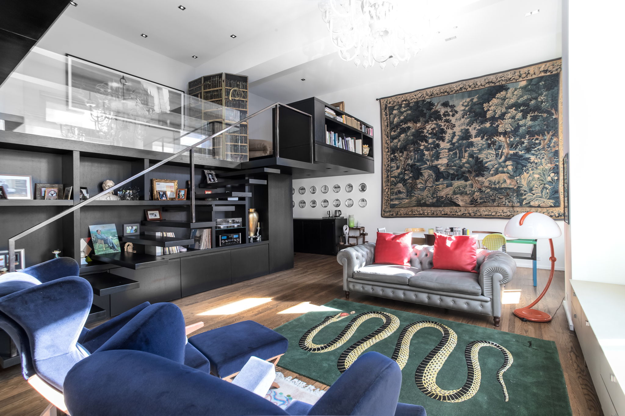 240 Centre Street, Unit 3H Manhattan, NY 10013 - Photo 4 of 20 a living room with furniture and a flat screen tv