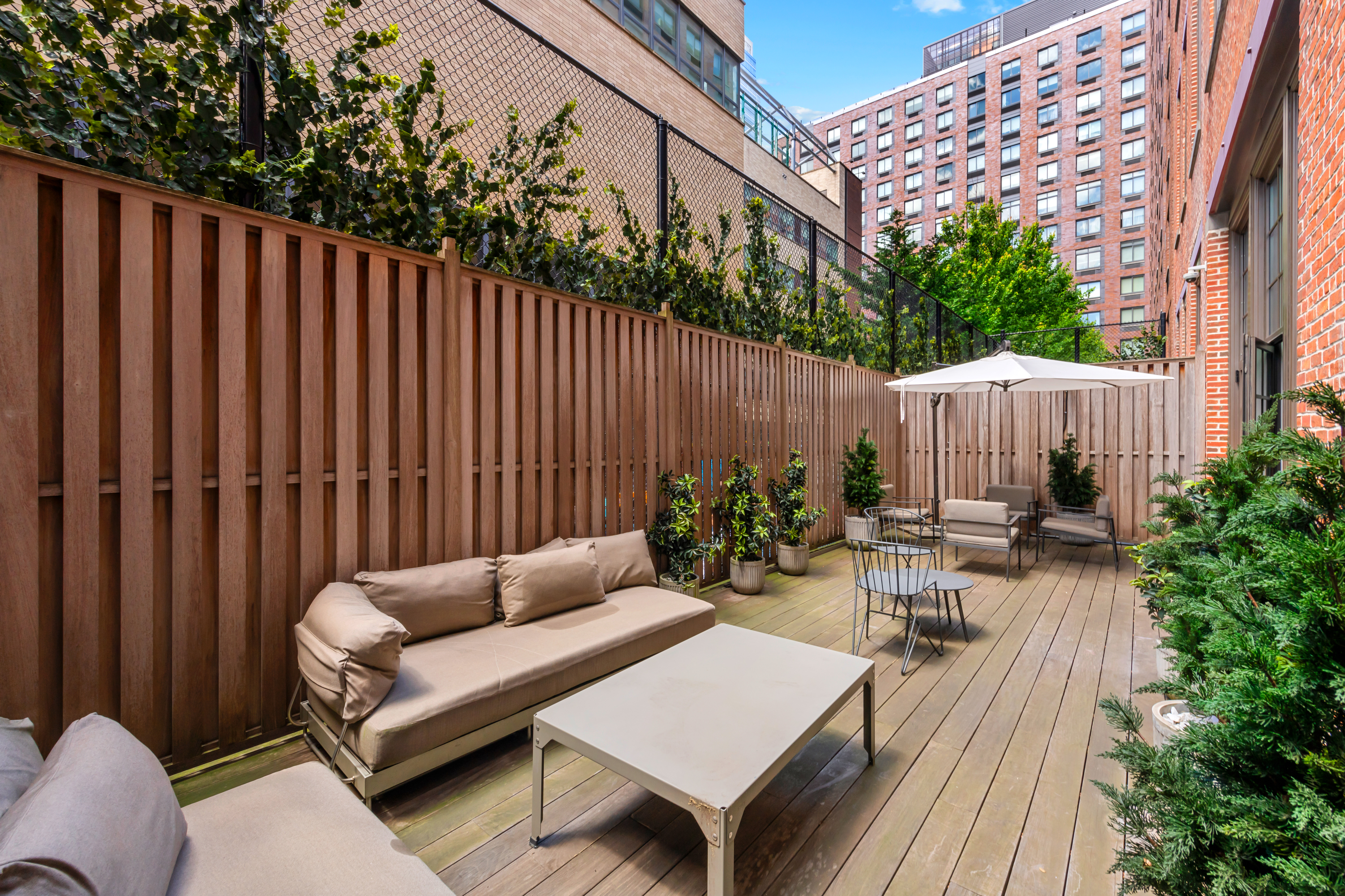 520 West 45th Street, Unit 4D Manhattan, NY 10036 - Photo 11 of 14 a view of a patio with couches and chairs