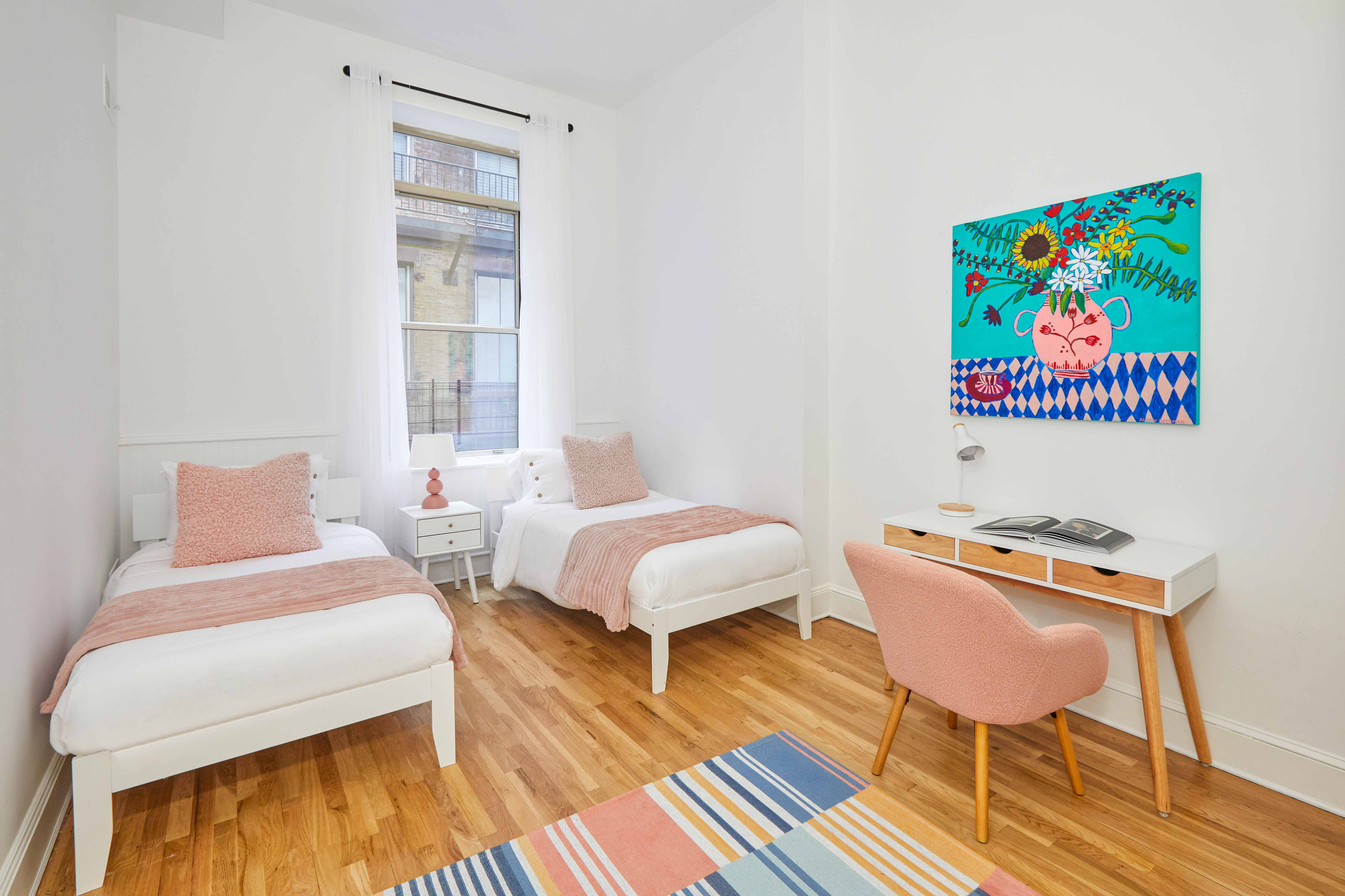 80 Leonard Street, Unit 3G Manhattan, NY 10013 - Photo 20 of 30 a bedroom with a bed and a desk
