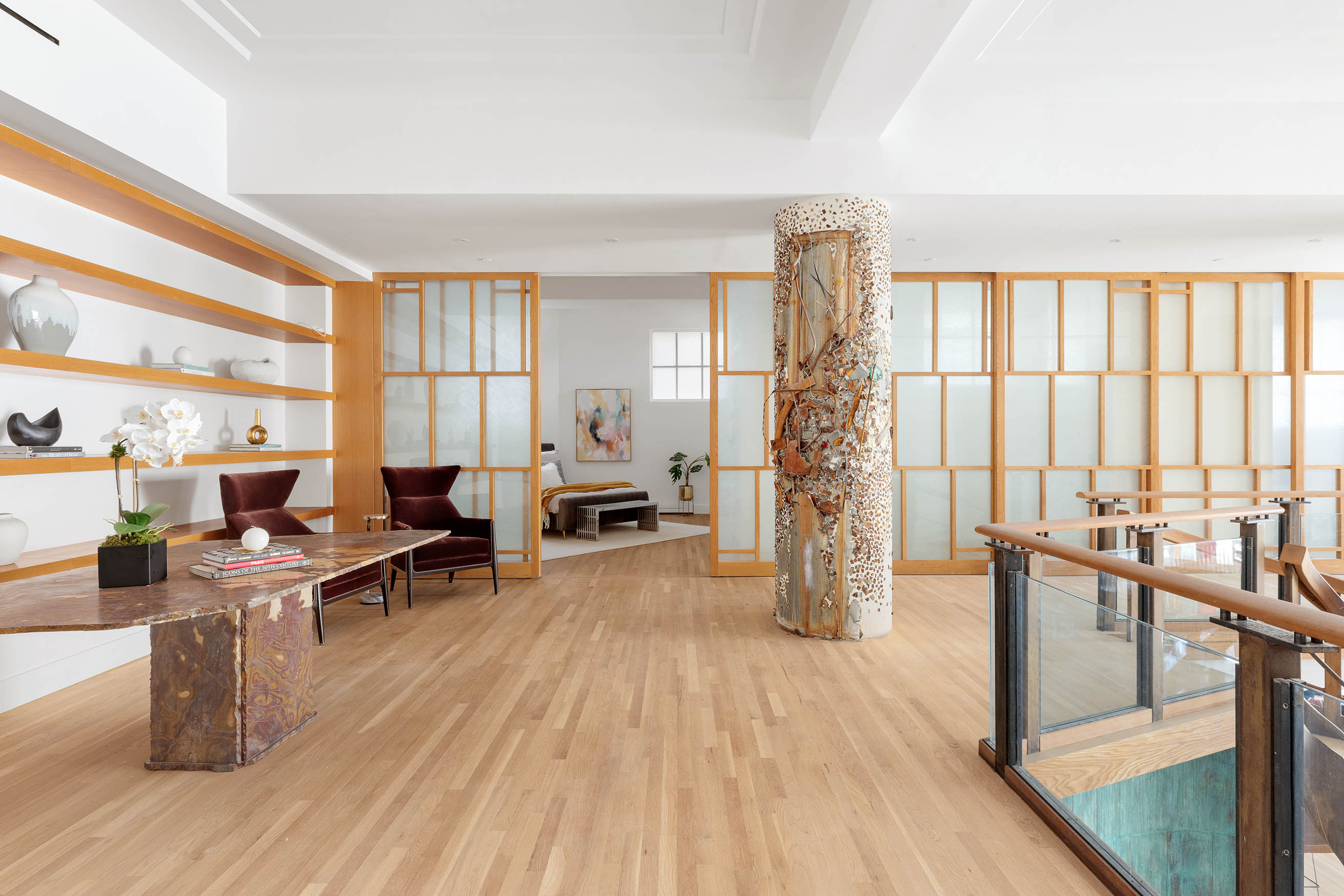 16 Jay Street, Unit 1 Manhattan, NY 10013 - Photo 10 of 16 a living room with furniture a large window and wooden floor