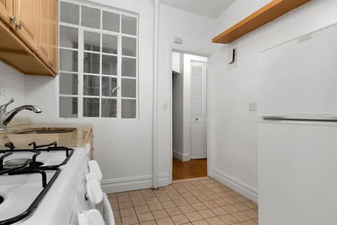 a bathroom with a toilet a sink and bathtub