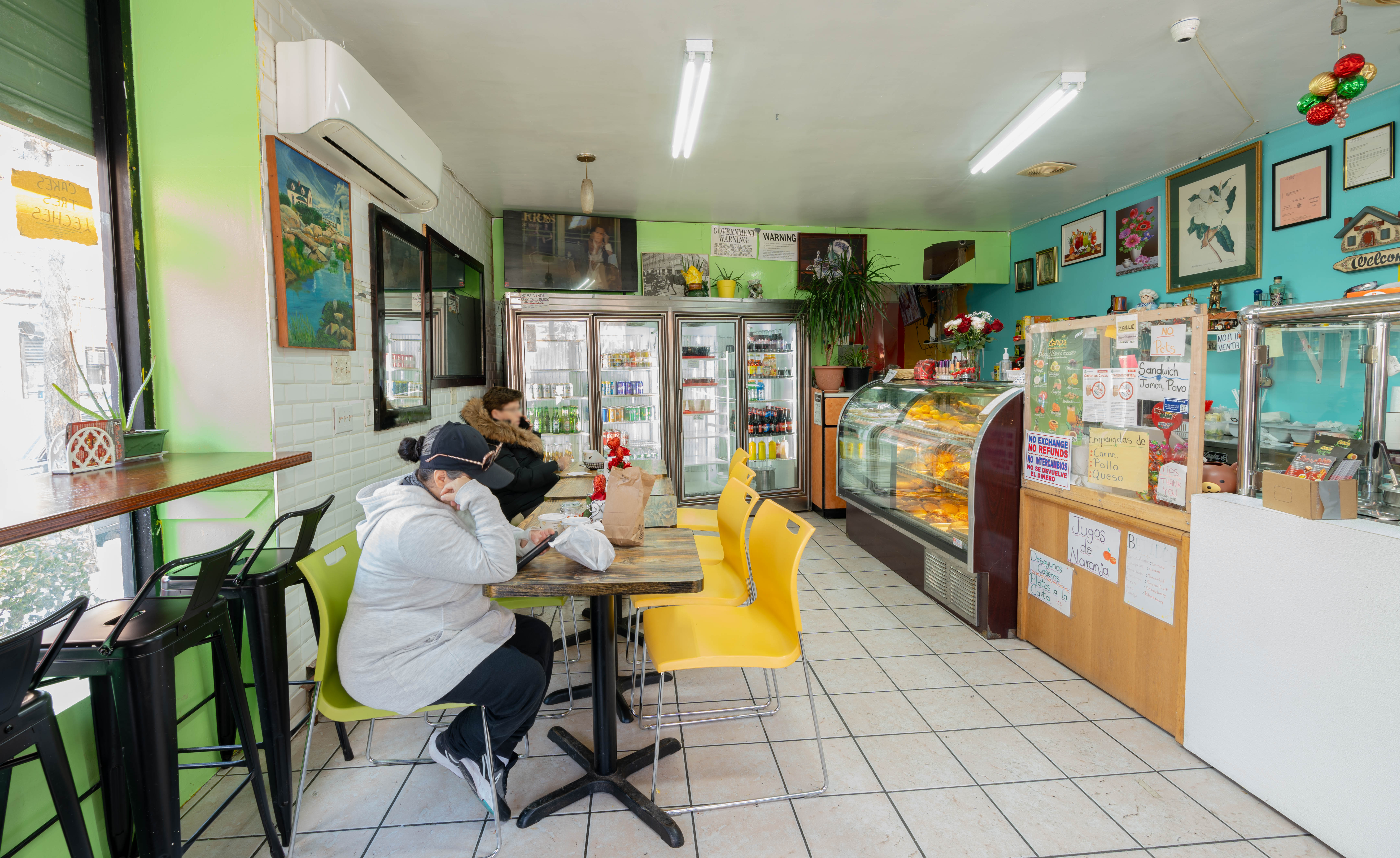 936 Seneca Avenue Queens, NY 11385 - Photo 2 of 12 a view of a dining room with furniture