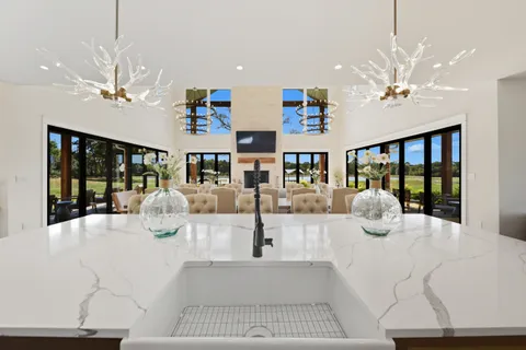 a view of living room with chandelier