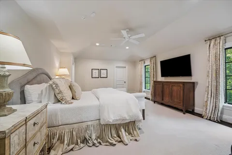 a spacious bathroom with a bathtub and a shower