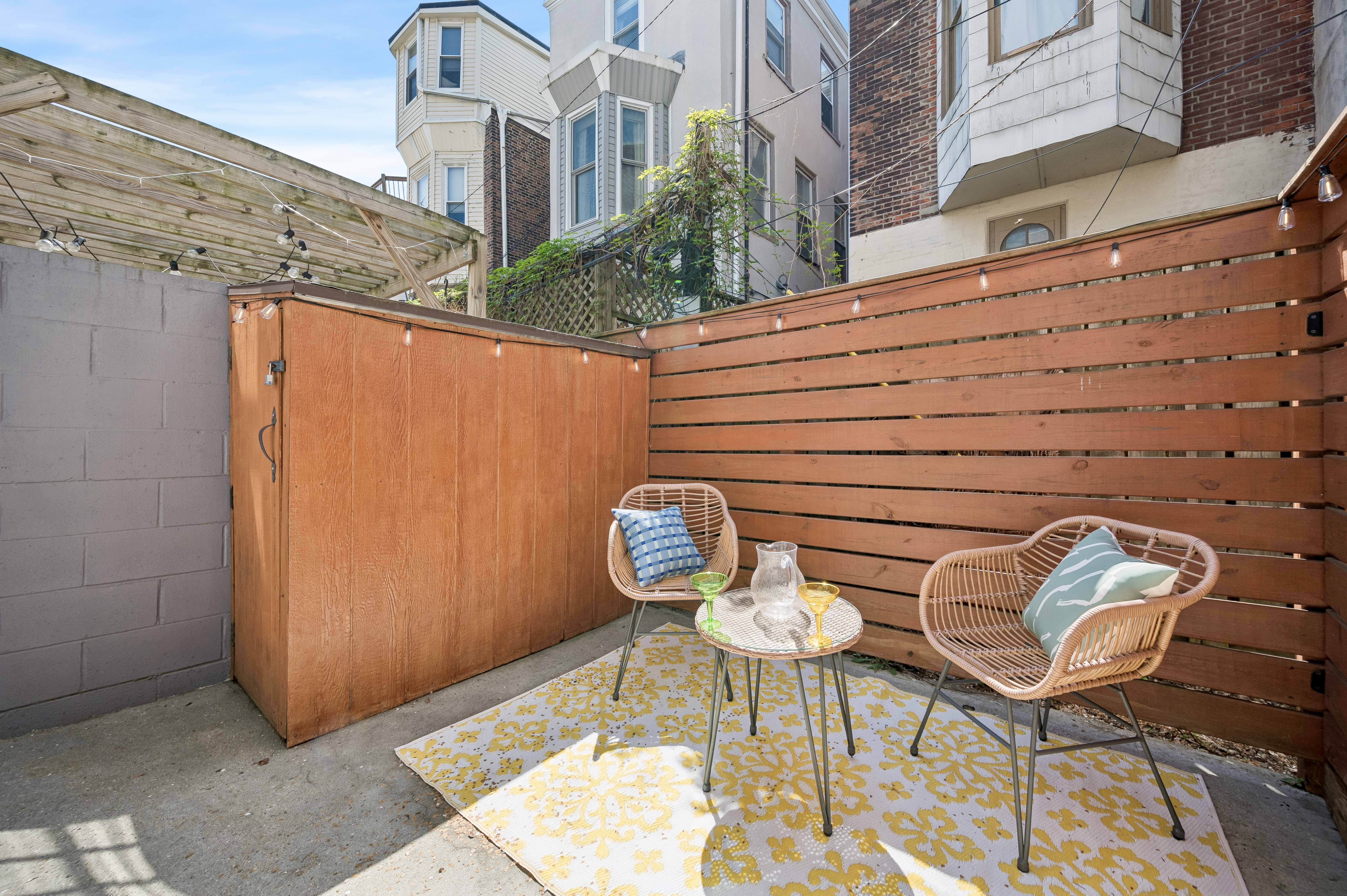 2420 Manning Street Philadelphia, PA 19103 - Photo 8 of 25 a backyard of a house with table and chairs