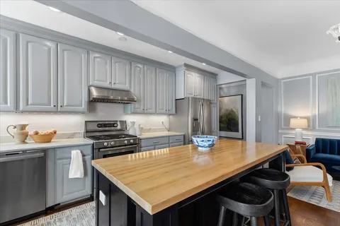a kitchen with a sink and a window