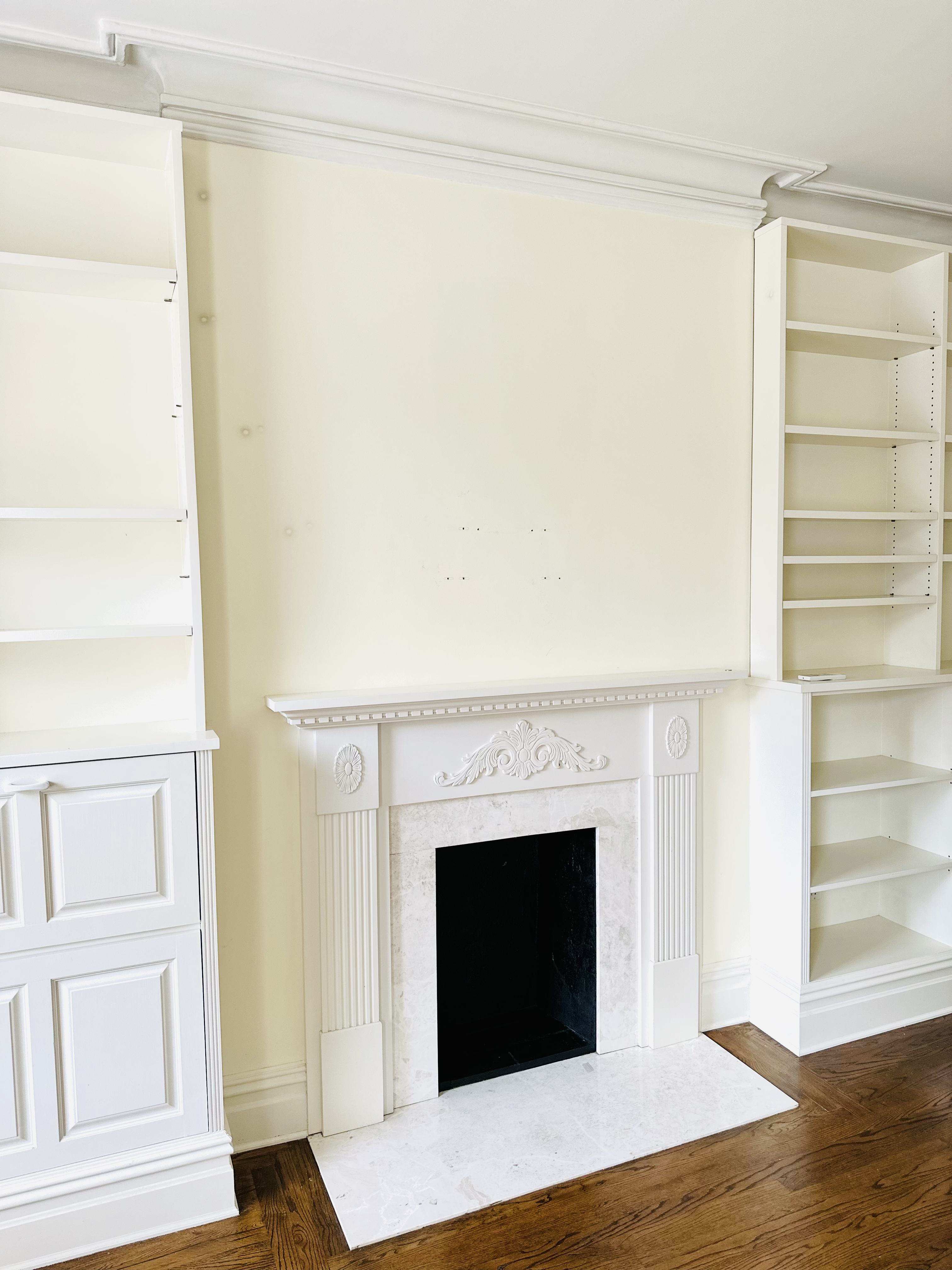 28 West 10th Street, Unit 4R Manhattan, NY 10011 - Photo 3 of 7 a room with a fireplace and wooden floor