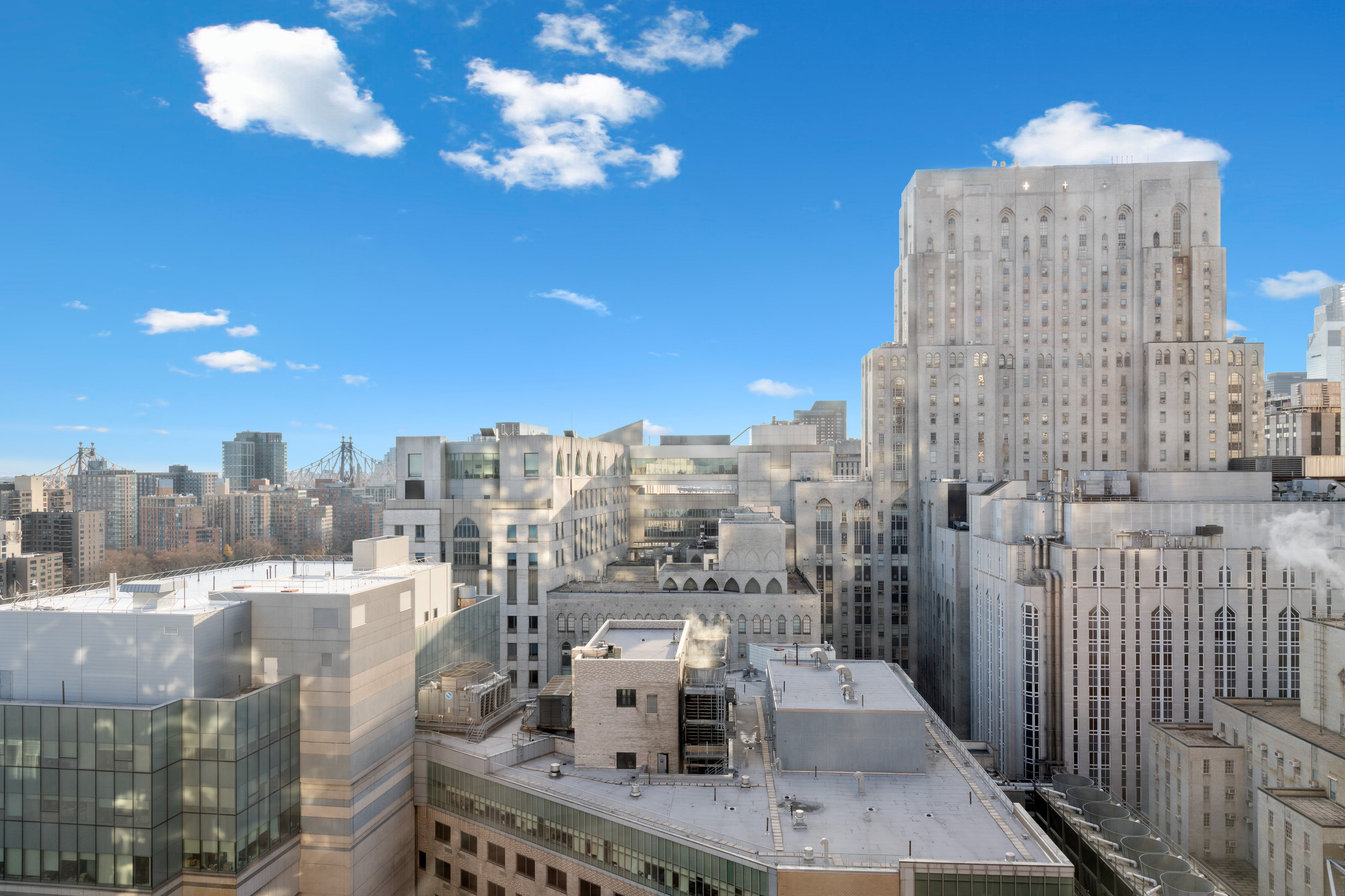 524 East 72nd Street, Unit 24A Manhattan, NY 10021 - Photo 7 of 12 a view of city with tall buildings