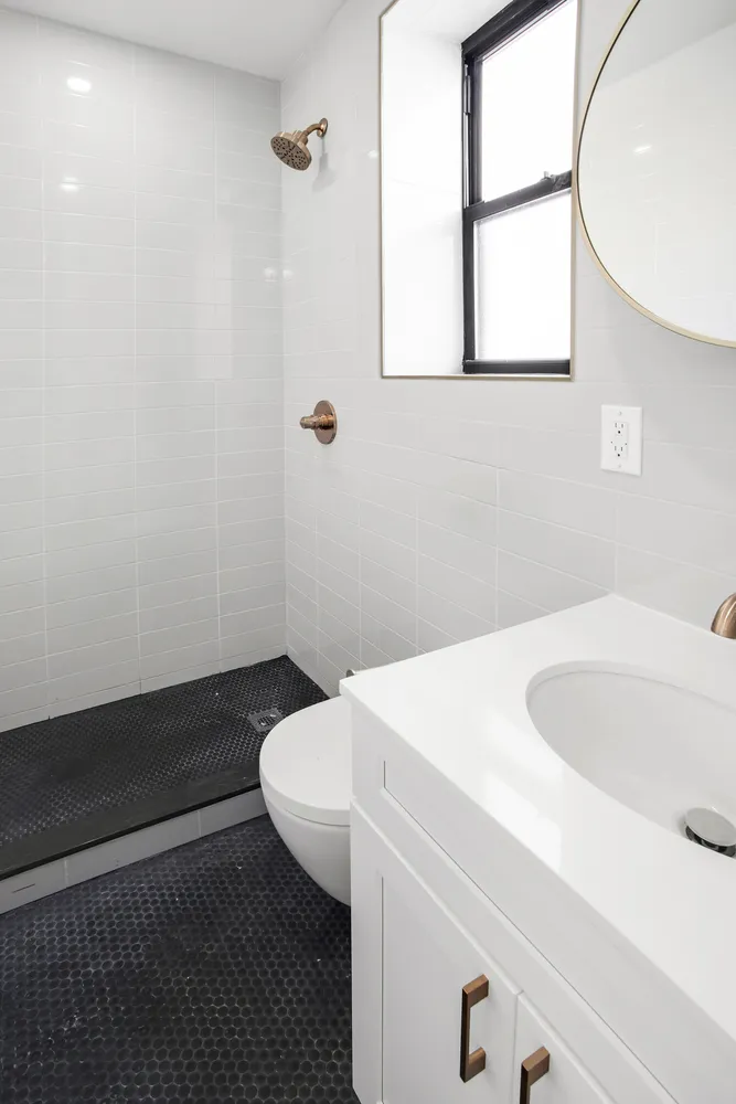 a bathroom with a sink and a toilet