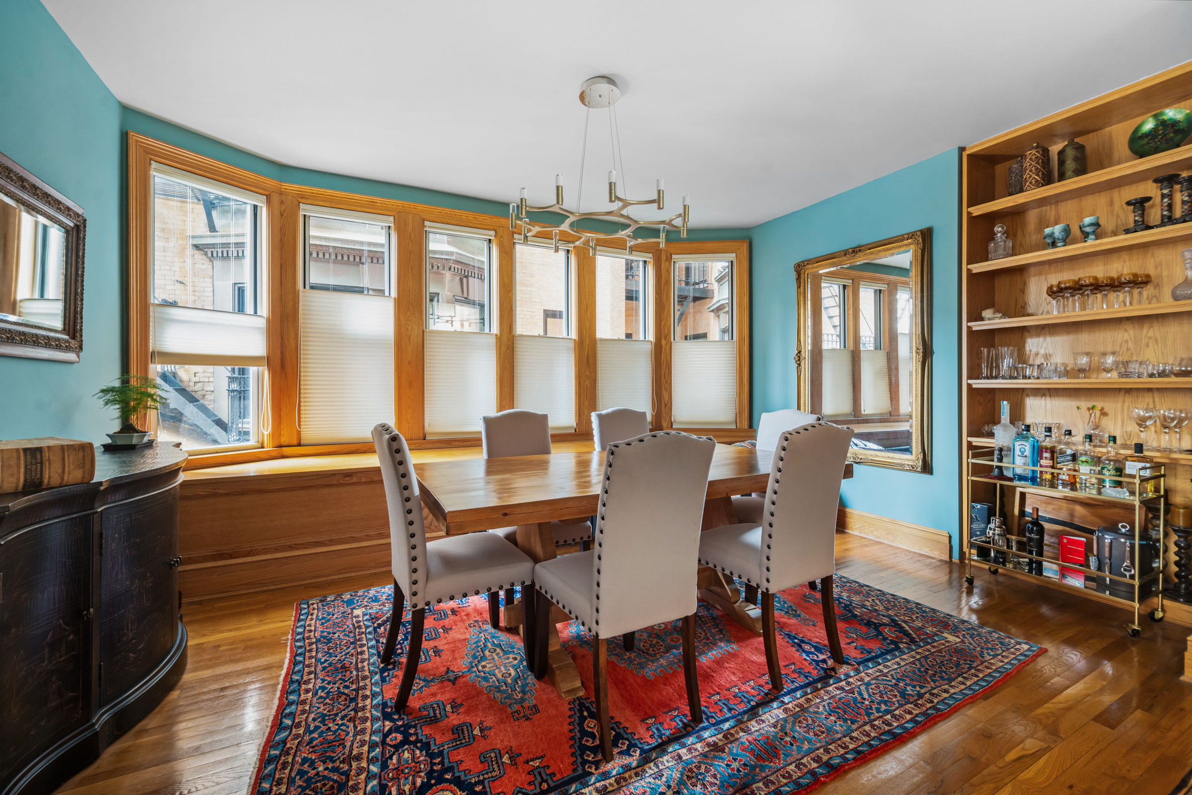 300 West 109th Street, Unit 2JK Manhattan, NY 10025 - Photo 8 of 18 a living room with furniture and a floor to ceiling window