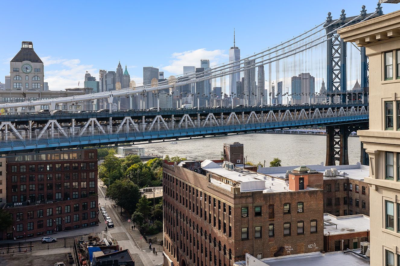 a view of a balcony with outdoor seating